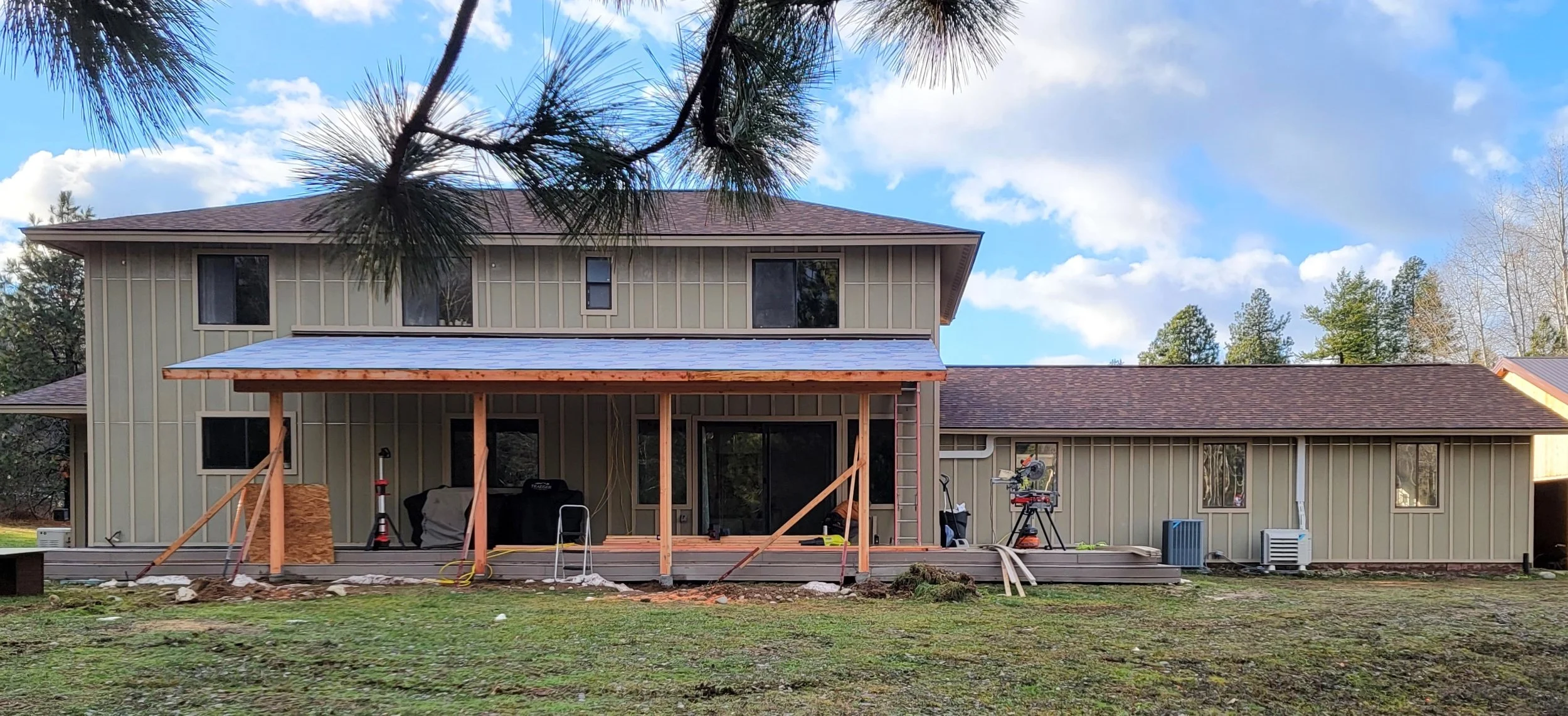 (After) Re-side: Hardie Board & Batten, Cedar Shiplap on Sunroom, Hardie Shake Accents, LP Trim & Soffits, Cedar Tongue & Groove Soffits