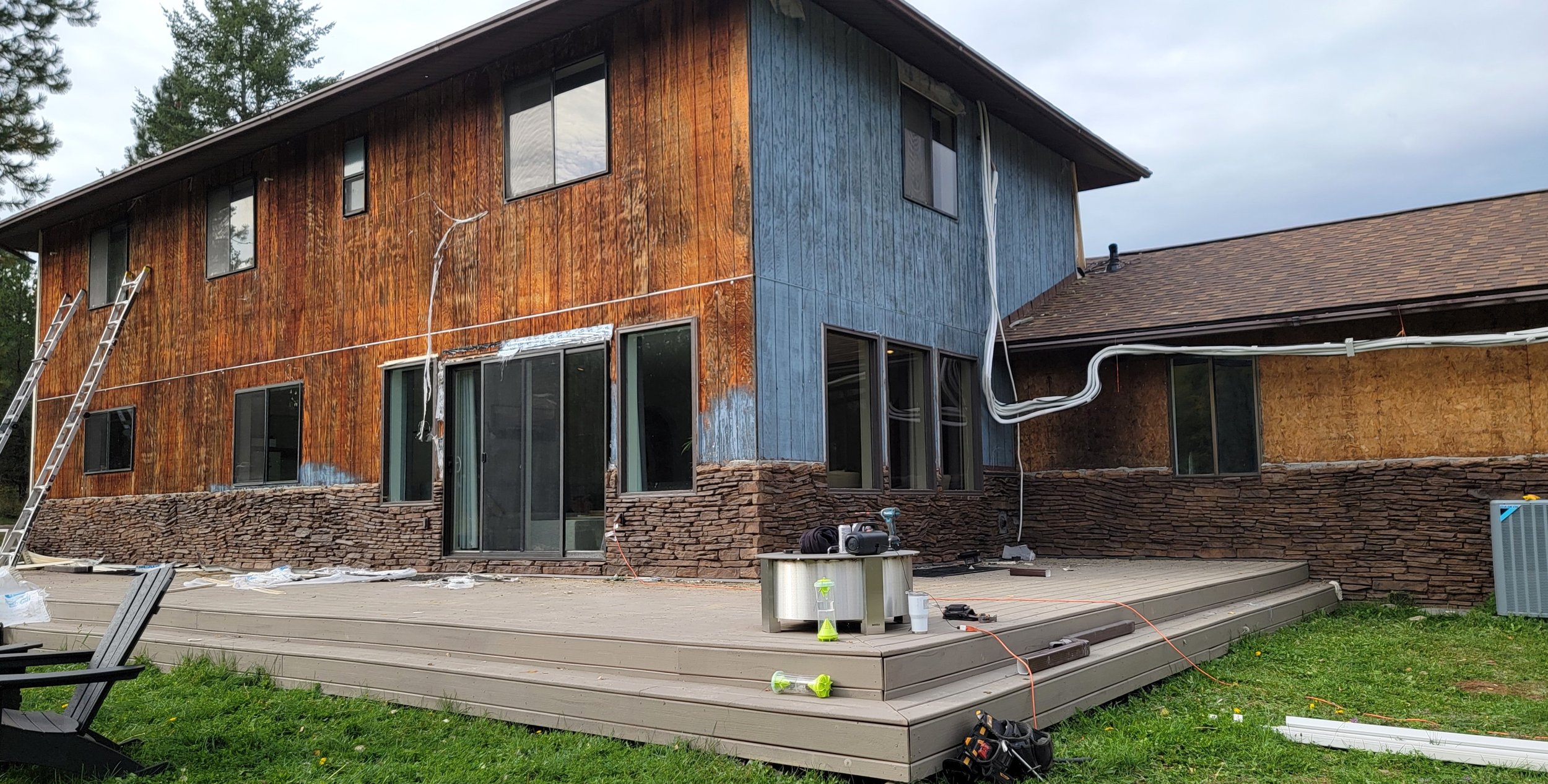 (During) Re-side: Hardie Board & Batten, Cedar Shiplap on Sunroom, Hardie Shake Accents, LP Trim & Soffits, Cedar Tongue & Groove Soffits