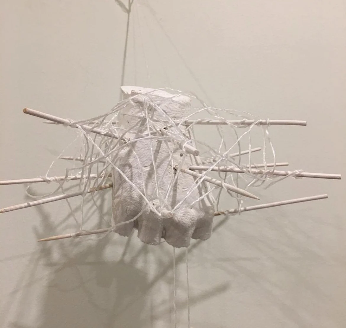 An art installation hand with spikes