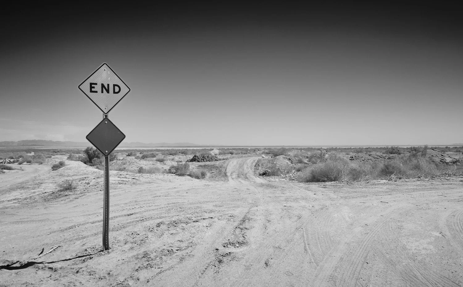 desolate-desert-highway-end-road-sign-fine-art-landscape-by-kip-dawkins