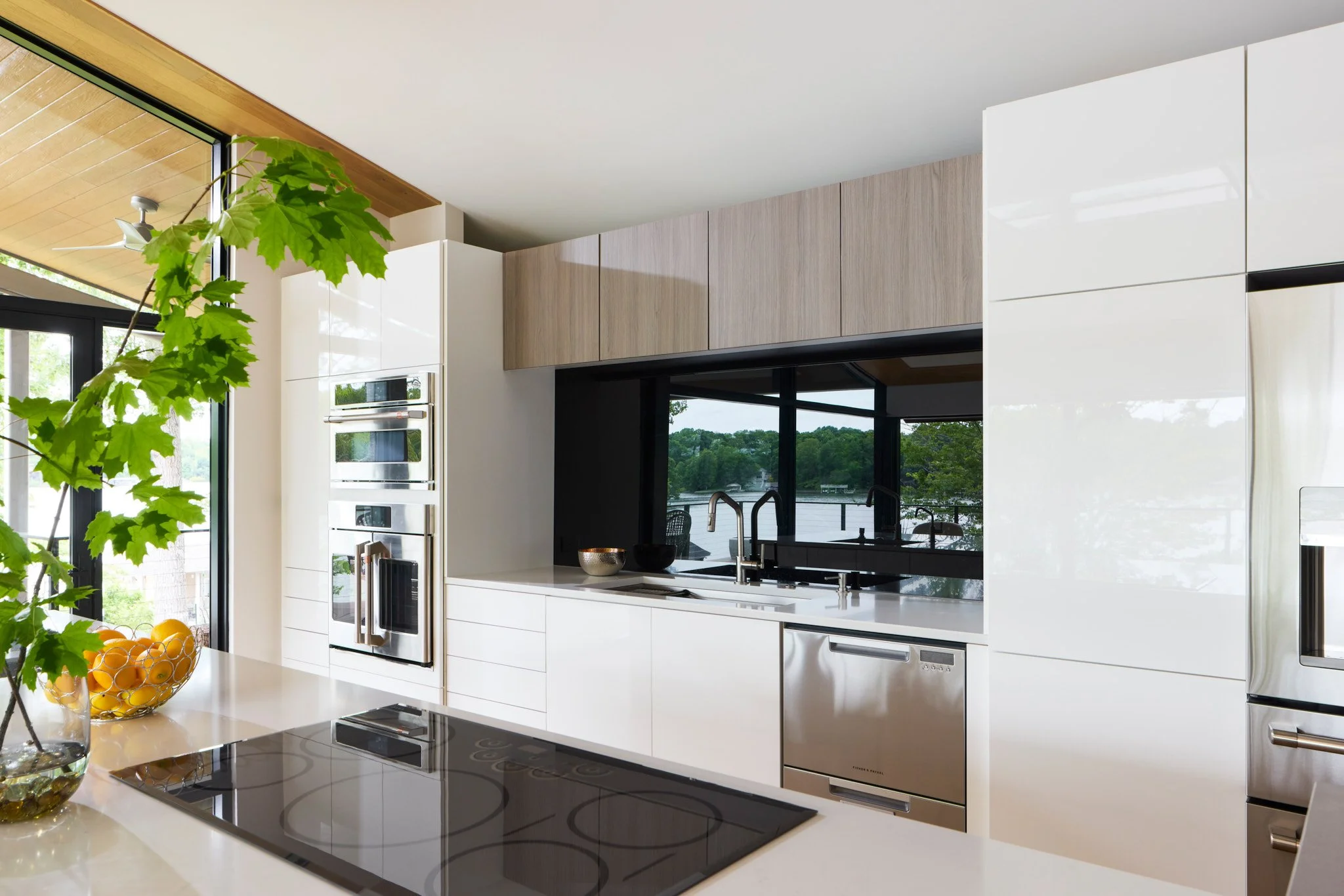 modern-kitchen-interior-design-photography-white-cabinets-lake-view-by-kip-dawkins.