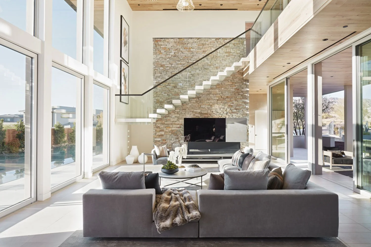 las-vegas-luxury-residential-architectural-photography-two-story-living-room-glass-stairs-by-kip-dawkins