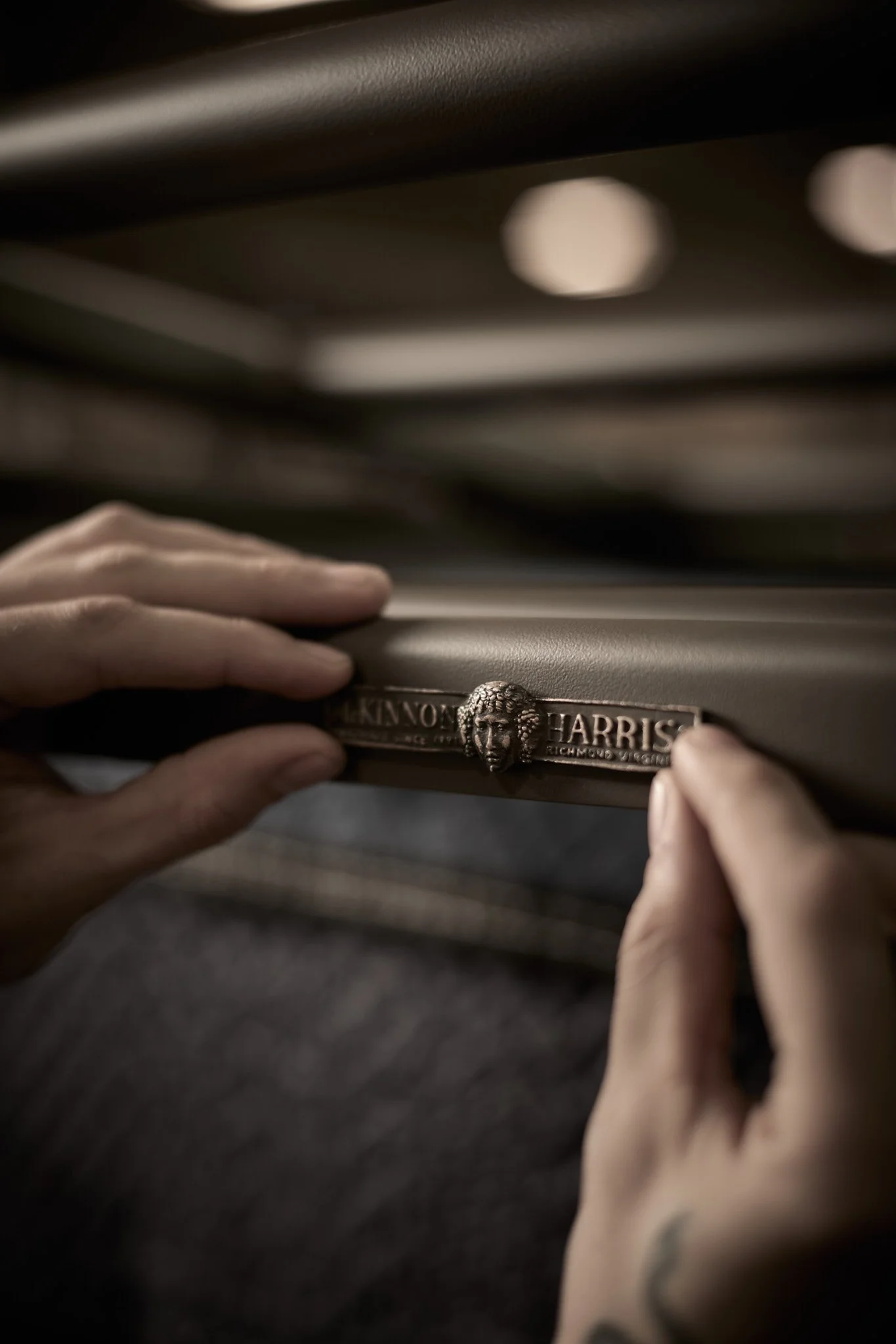  mckinnon-and-harris-luxury-brand-emblem-metalwork-engraving-by-kip-dawkins