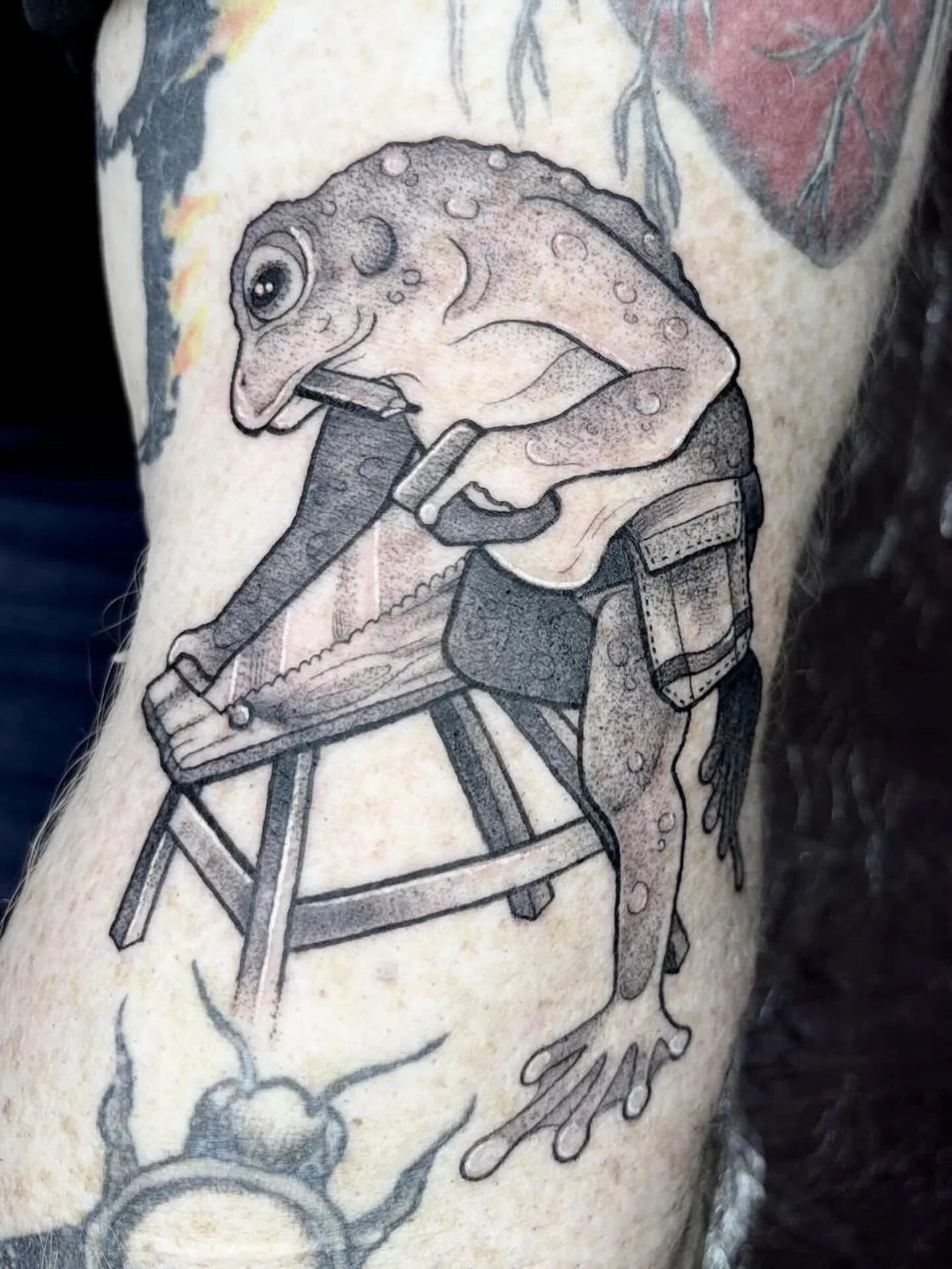 Joiner frog tattoo by @ambergoldietattoo Amber has spaces available in April #frog #frogtattoo #blackworktattoo #dotworktattoo