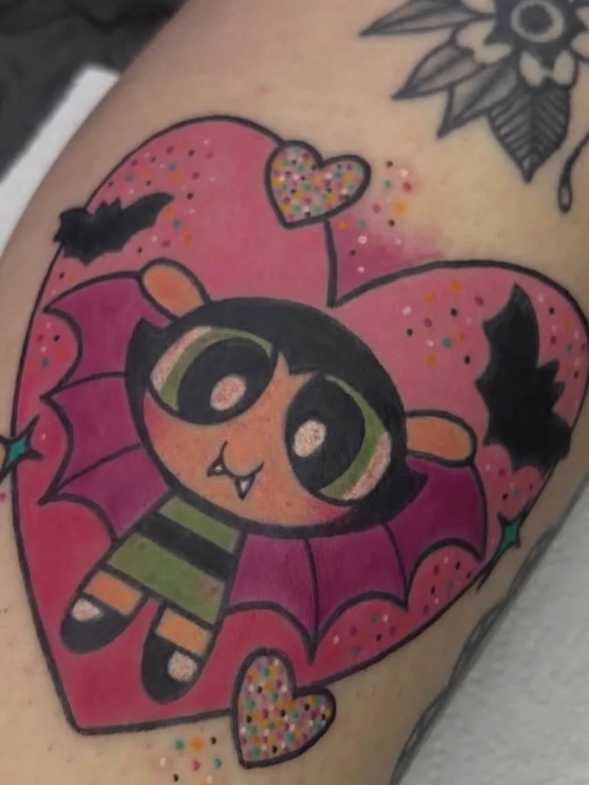 Powder puff girl tattoo by @emilybennetttattoo Emily has spaces available in May and June, dm her if you&rsquo;d like to book in or enquire 
#colourtattoo #pinktattoo #traditionaltattoos #tradtattoo