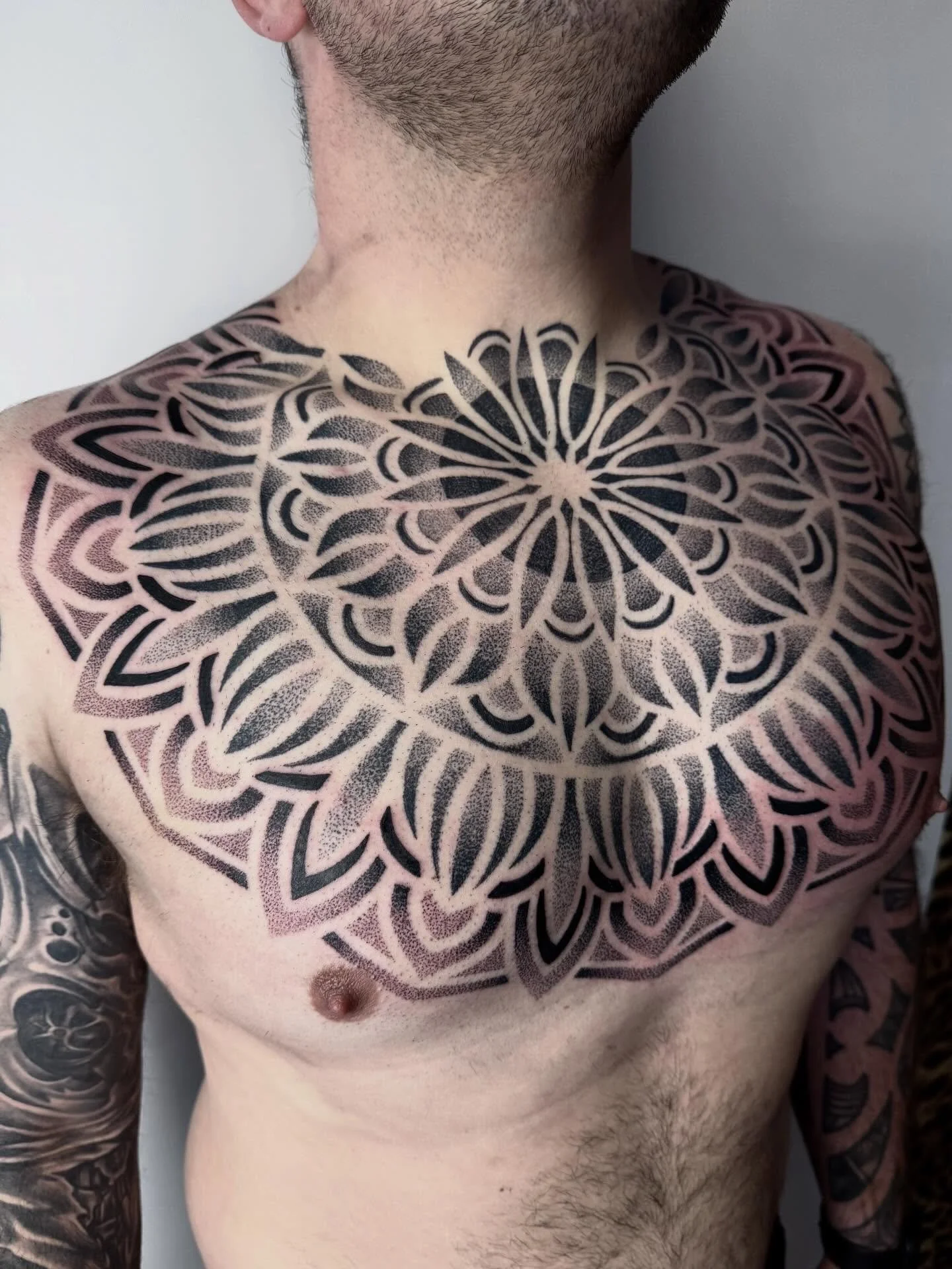 Chest tattoo by @shandannmarie #dotwork #dotworktattoo #mandala #mandalatattoo #chesttattoo