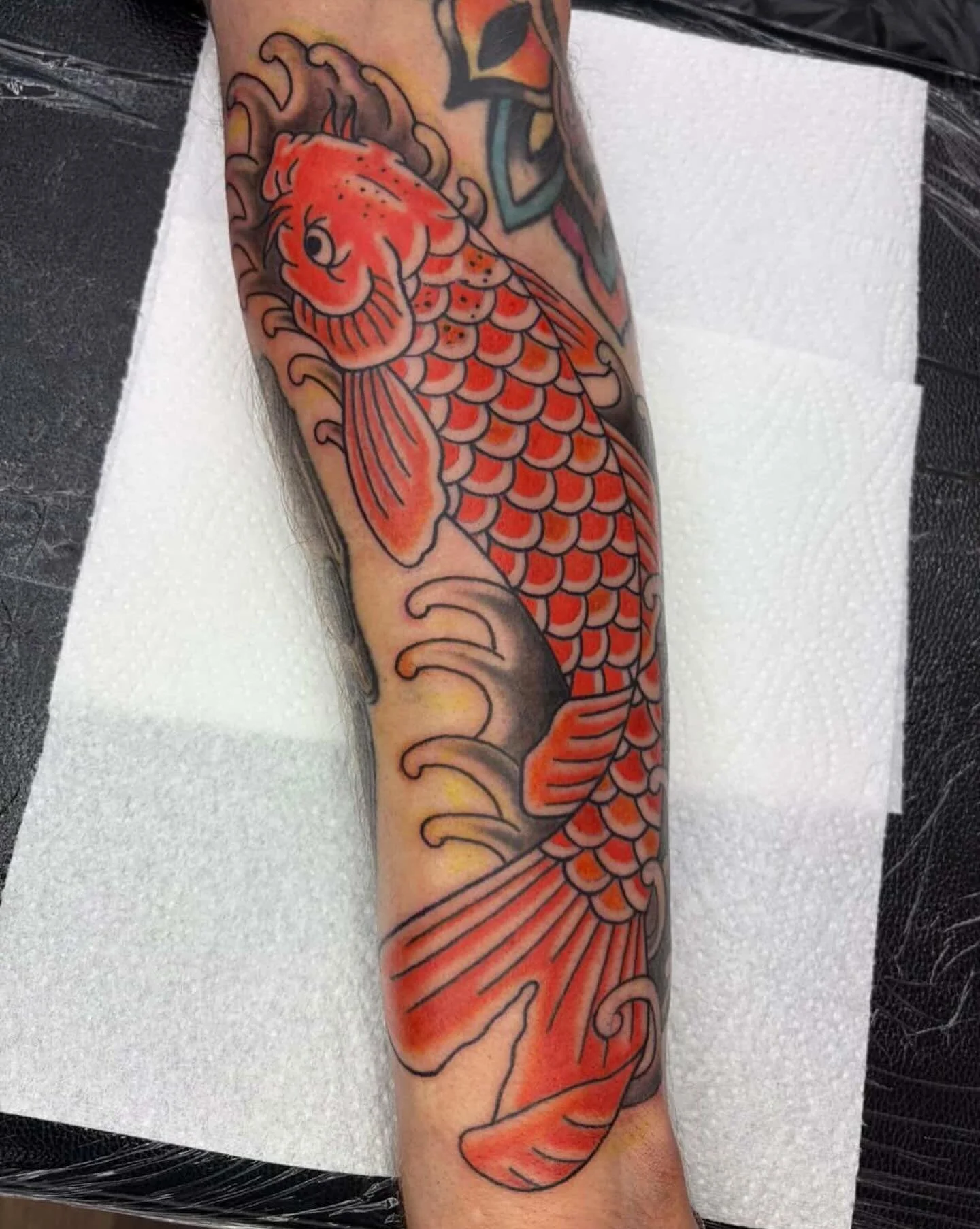Koi fish by @emilybennetttattoo she has been loving getting busier with traditional style tattoos and is keen to book in lots more (especially Japanese) dm her to enquire #koi #koifish #koitattoo #koifishtattoo #japanese