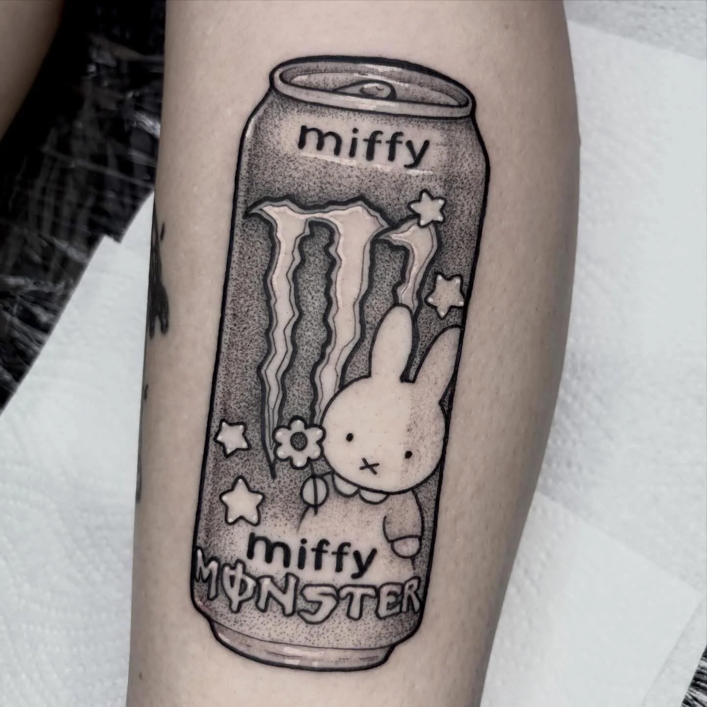 Very cool can of monster tattoo by our @ambergoldietattoo #tattoo #monster #monsterenergy #miffy #dotworktattoo