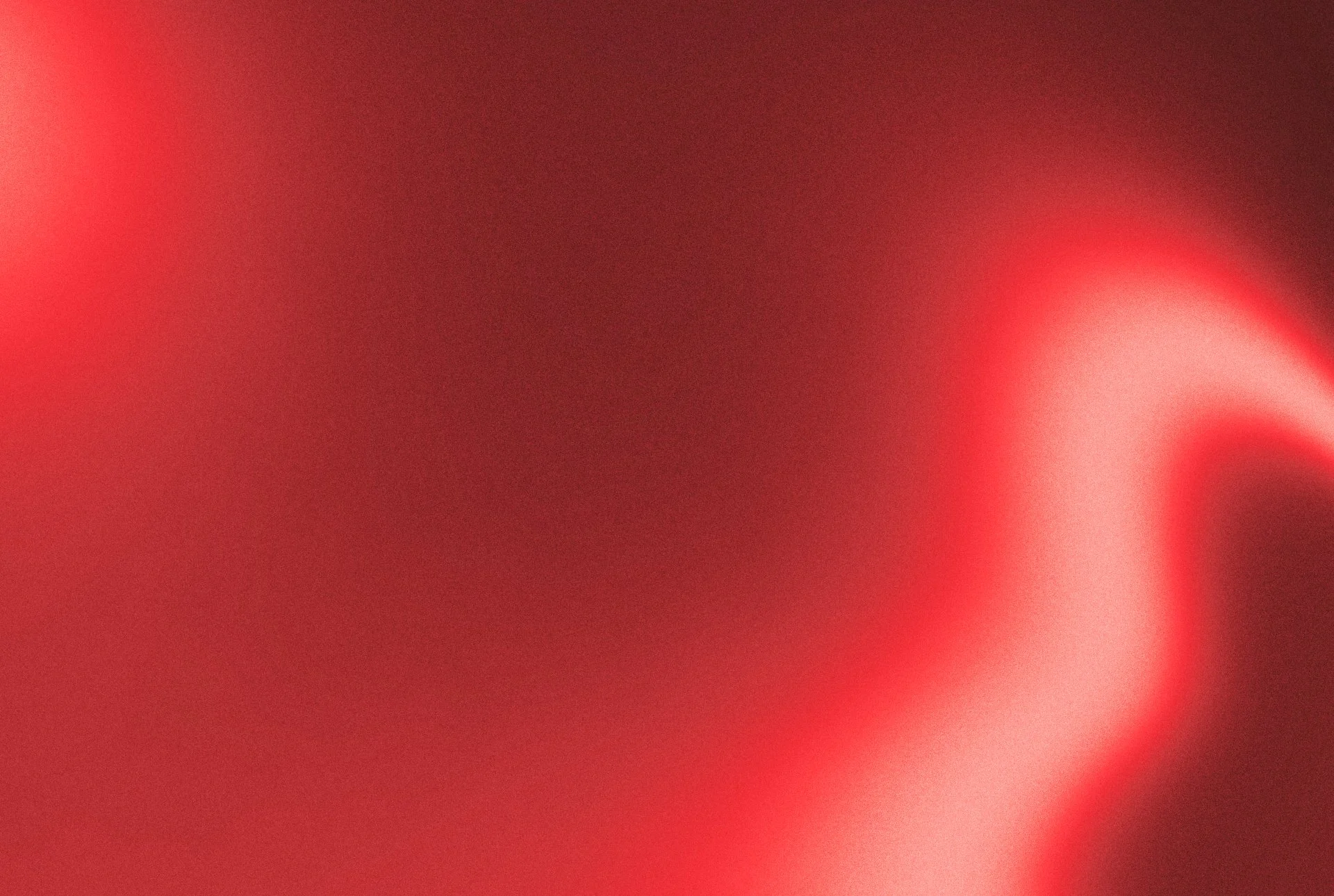 A red, aura-like background with a soft glow.