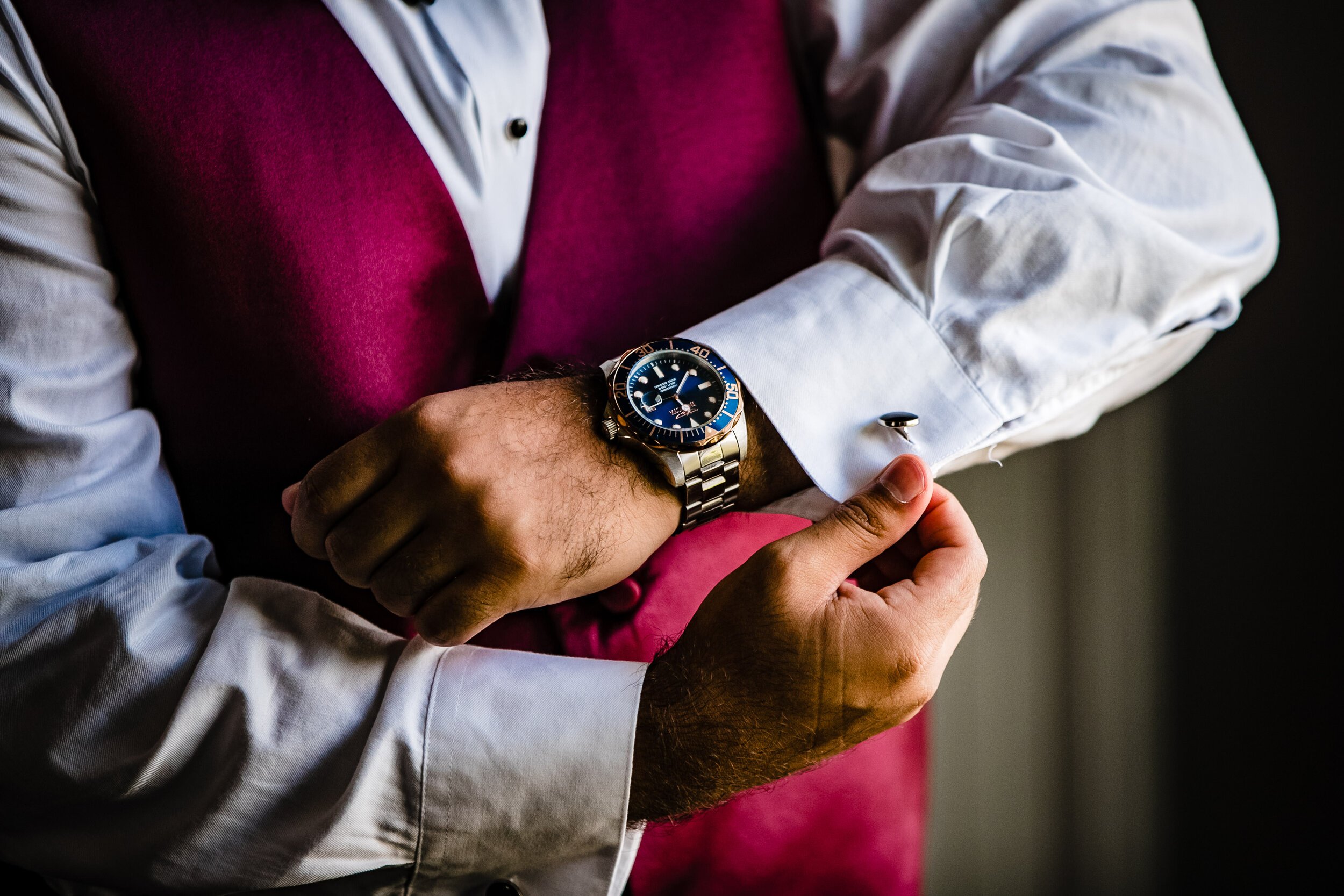 groom-putting-on-nautica-watch-Davenport-Mansion-Wedding-©-Best-NJ-NYC-Bucks-County-Wedding-Photographer-Daniel Nydick-17.jpg
