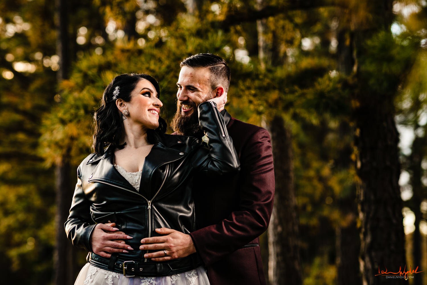 nj pinup goth bride in leather jacket poortrait with smiling gro