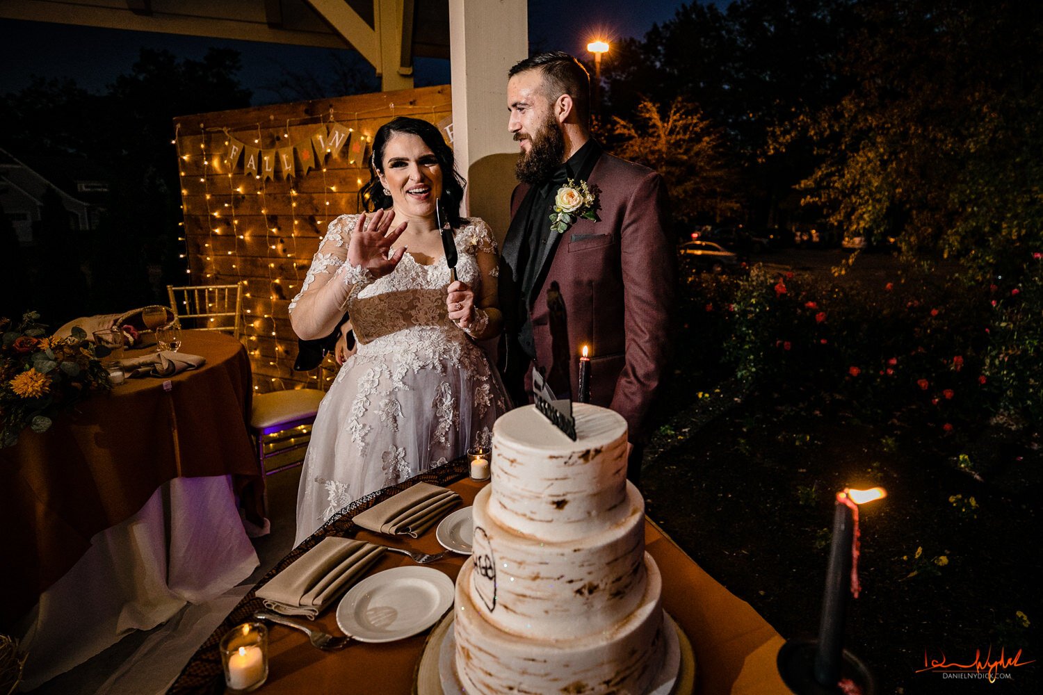 nj pinup goth bride and groom laughing at cake cutting at hallow
