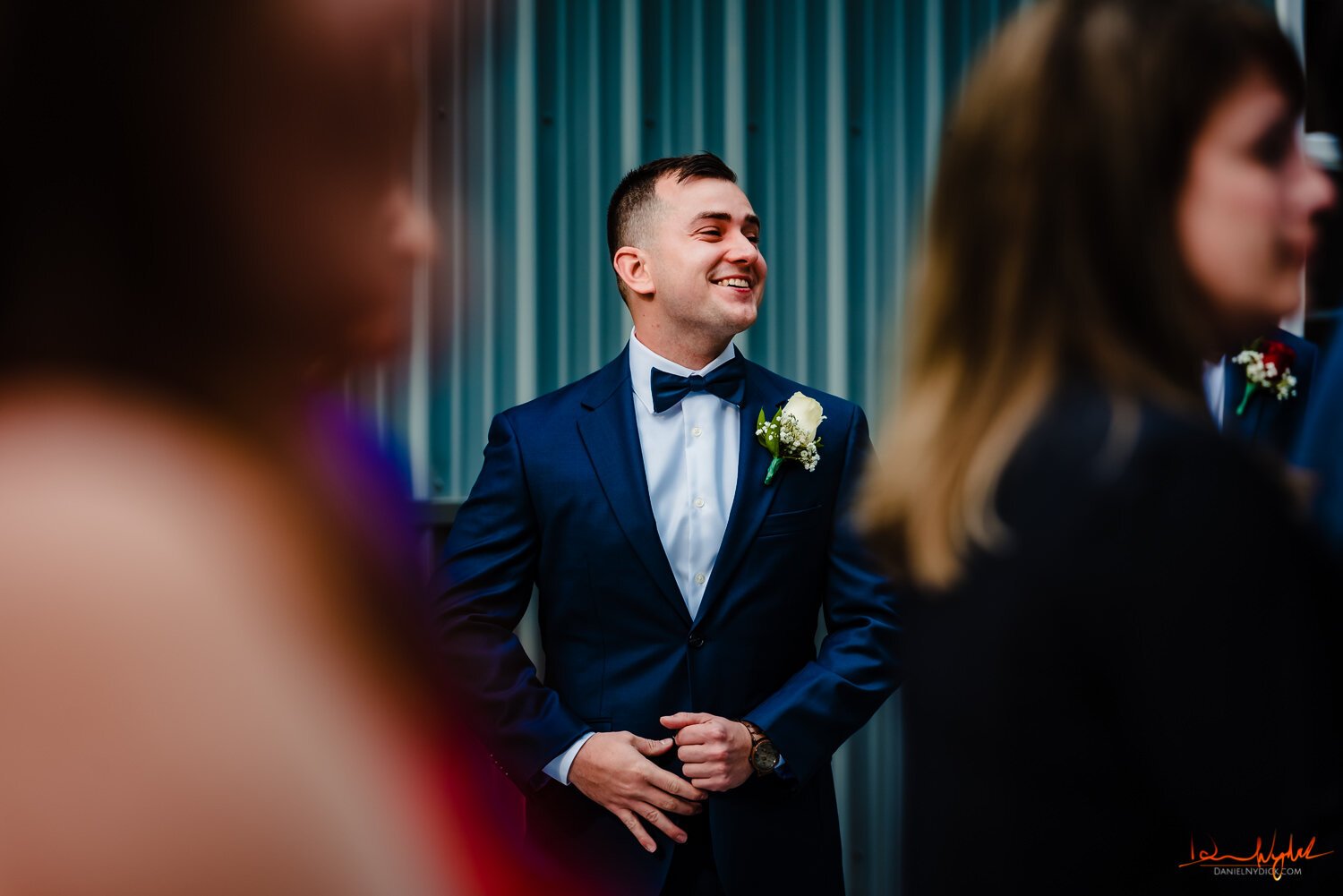 excited groom at his rustic nj barn wedding ceremony