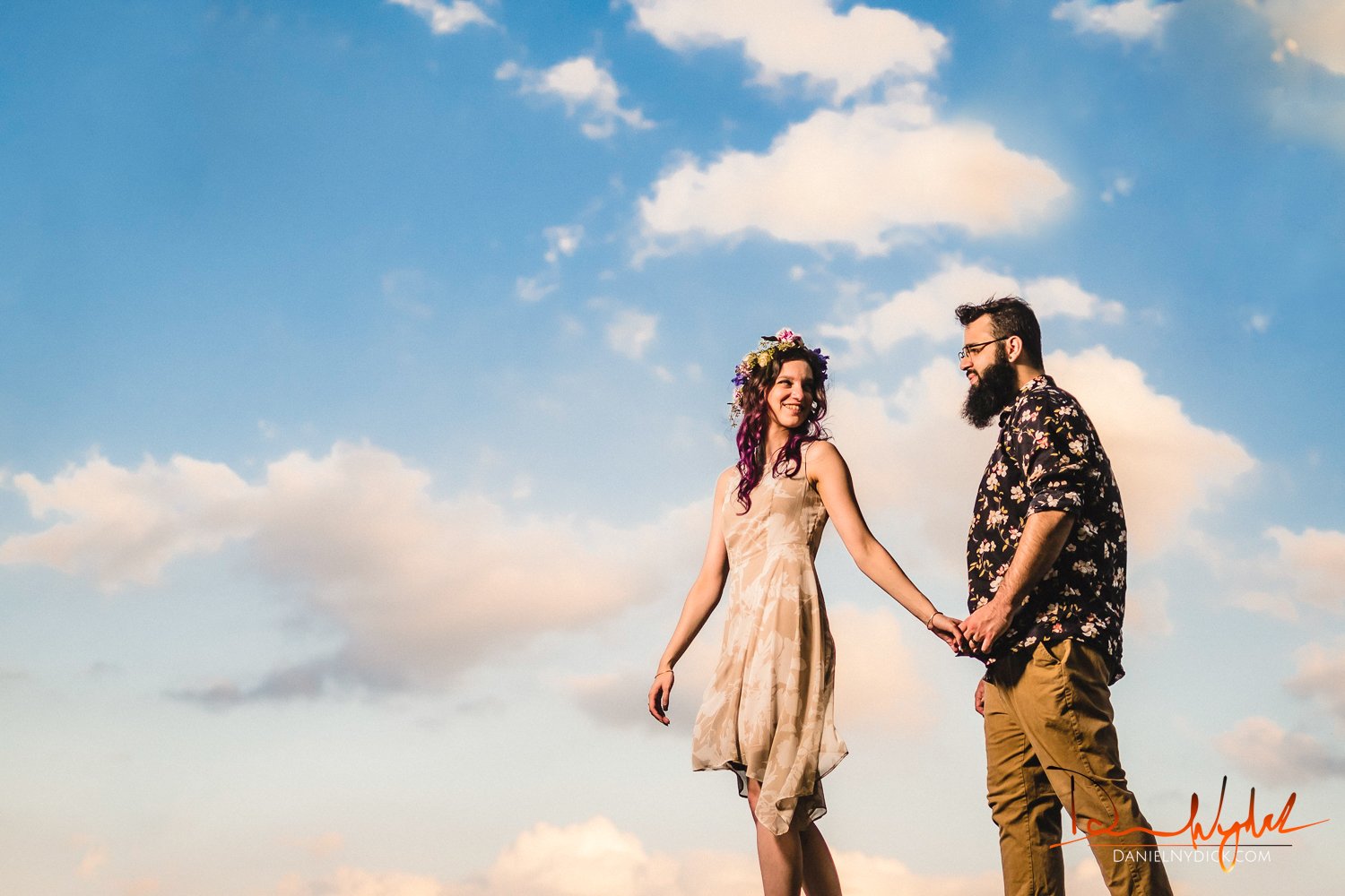 nj engagement wedding portrait angainst blue sky and clouds