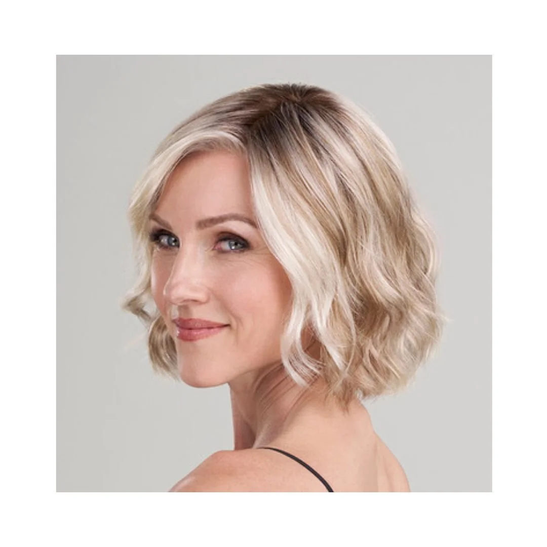 January is one of the most popular synthetic lace front wigs in the SmartLace&trade; collection. With her carefree textured waves, this stunning short wig style features a monofilament top that allows the wearer to part the hair in any direction, and