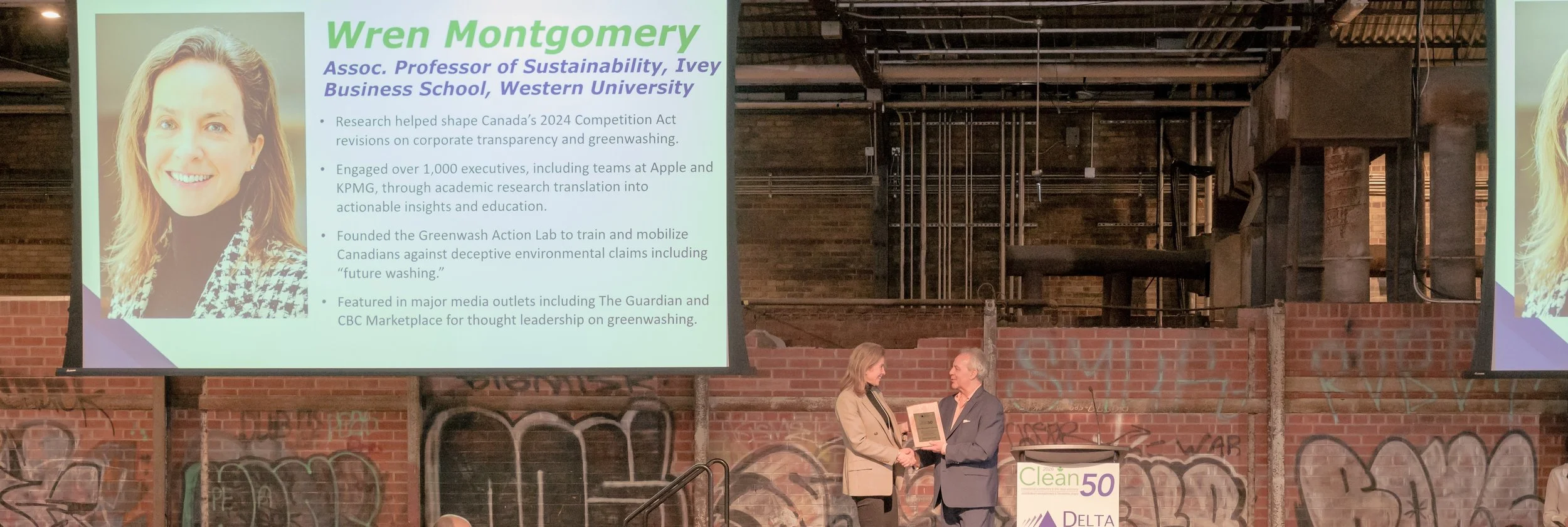 Wren Montgomery on stage accepting Canada Clean50 award