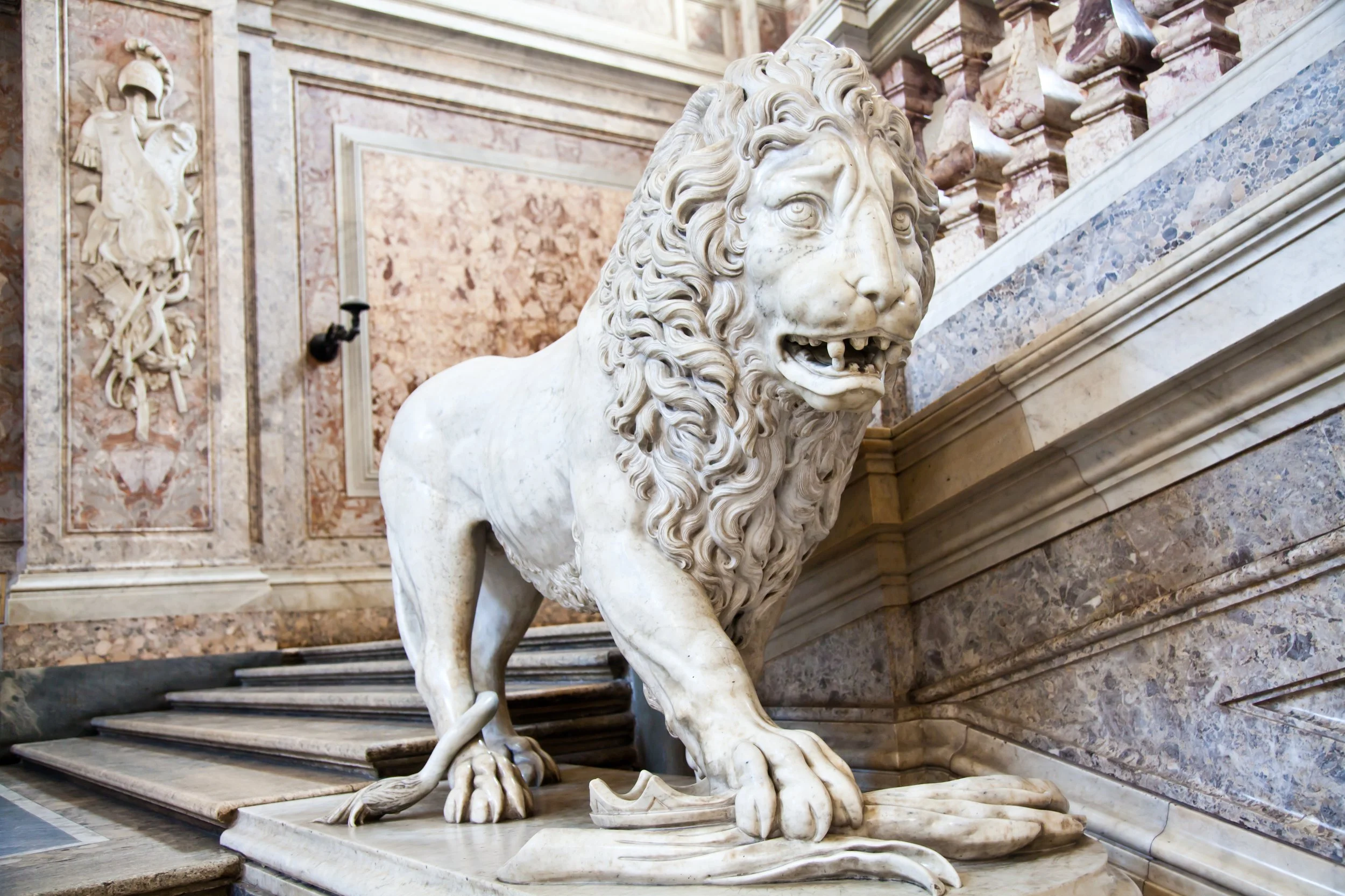 A lion sculpture in a museum