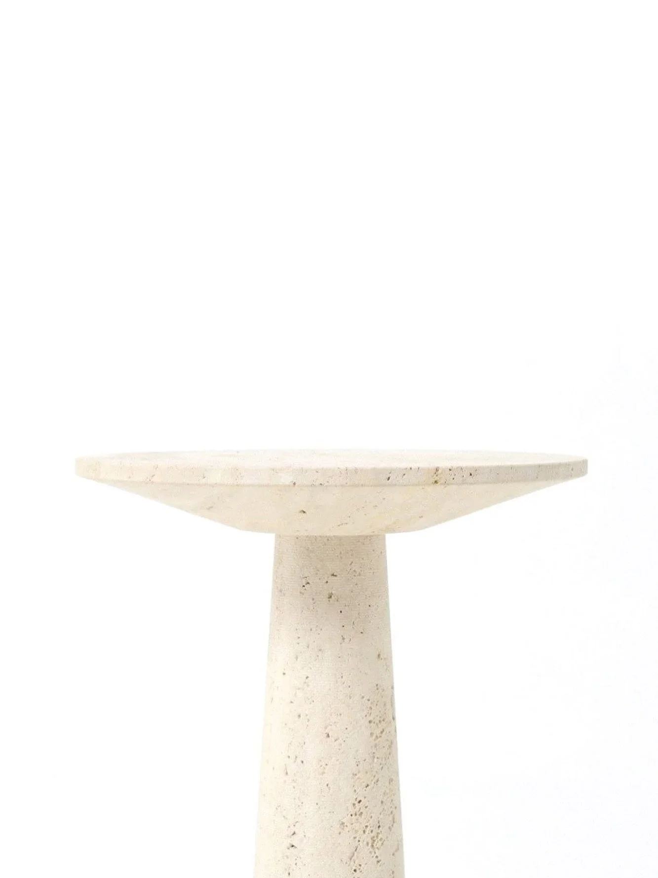 Rediscovered 

We are delighted to share that we have once again found a rare treasure from the past: an Italian travertine pedestal side table by P.A. Giusti &amp; E. Di Rosa.

This sculptural piece, which we had the honor of curating before, has re