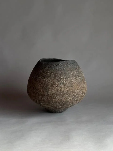 Sculptural ceramic vessel by Hiroshi Aoki, showcasing organic form and stone-like texture rooted in Japanese ceramic tradition..jpeg