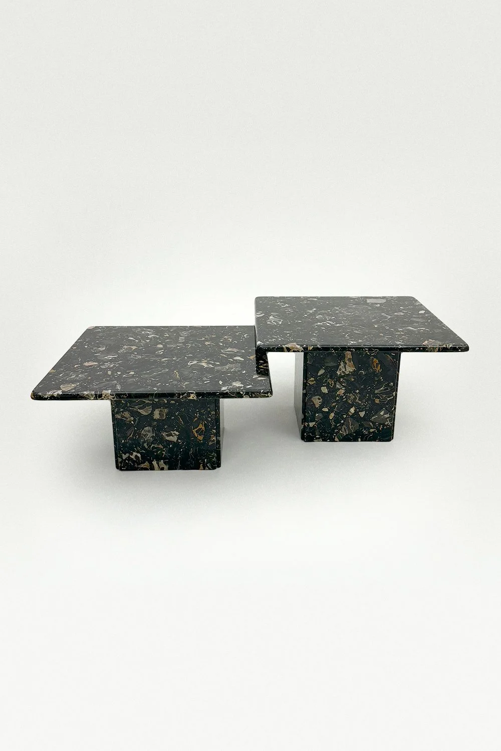 Unique set of Black, White, and Amber Marble Coffee Tables
