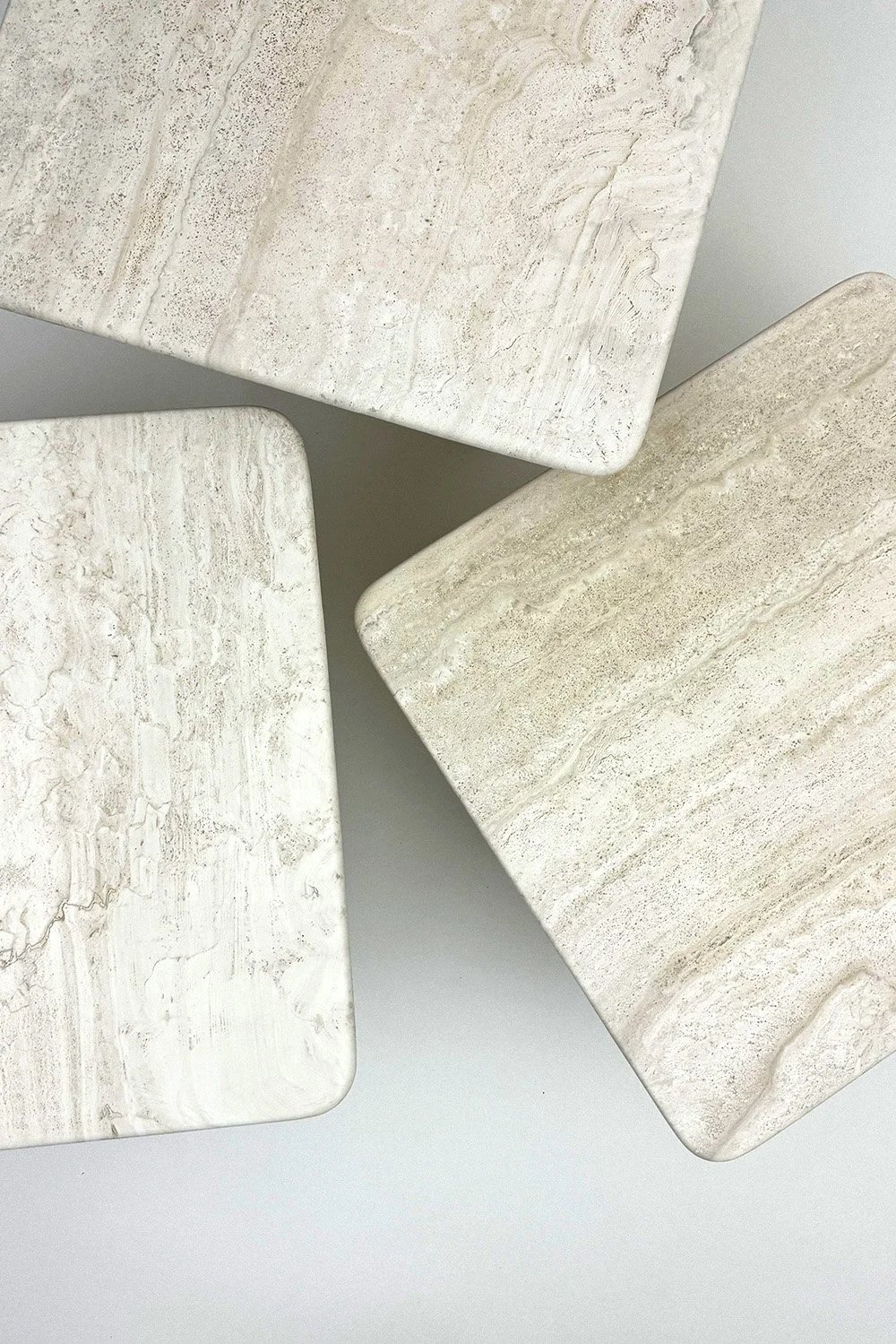 VVInteriorHome-Set-Three-Travertine-Side-Tables-Italy-1970s-01.jpg