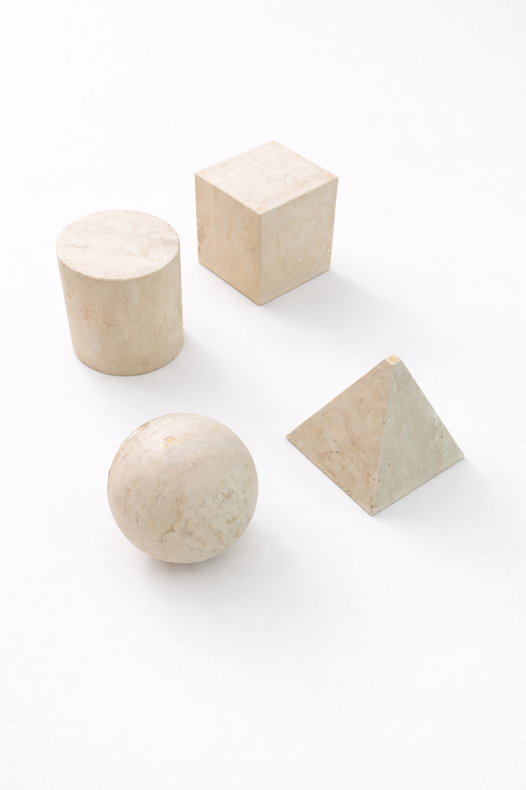 Metafora Coffee Table in Travertine – Massimo and Lella Vignelli for Casigliani.png