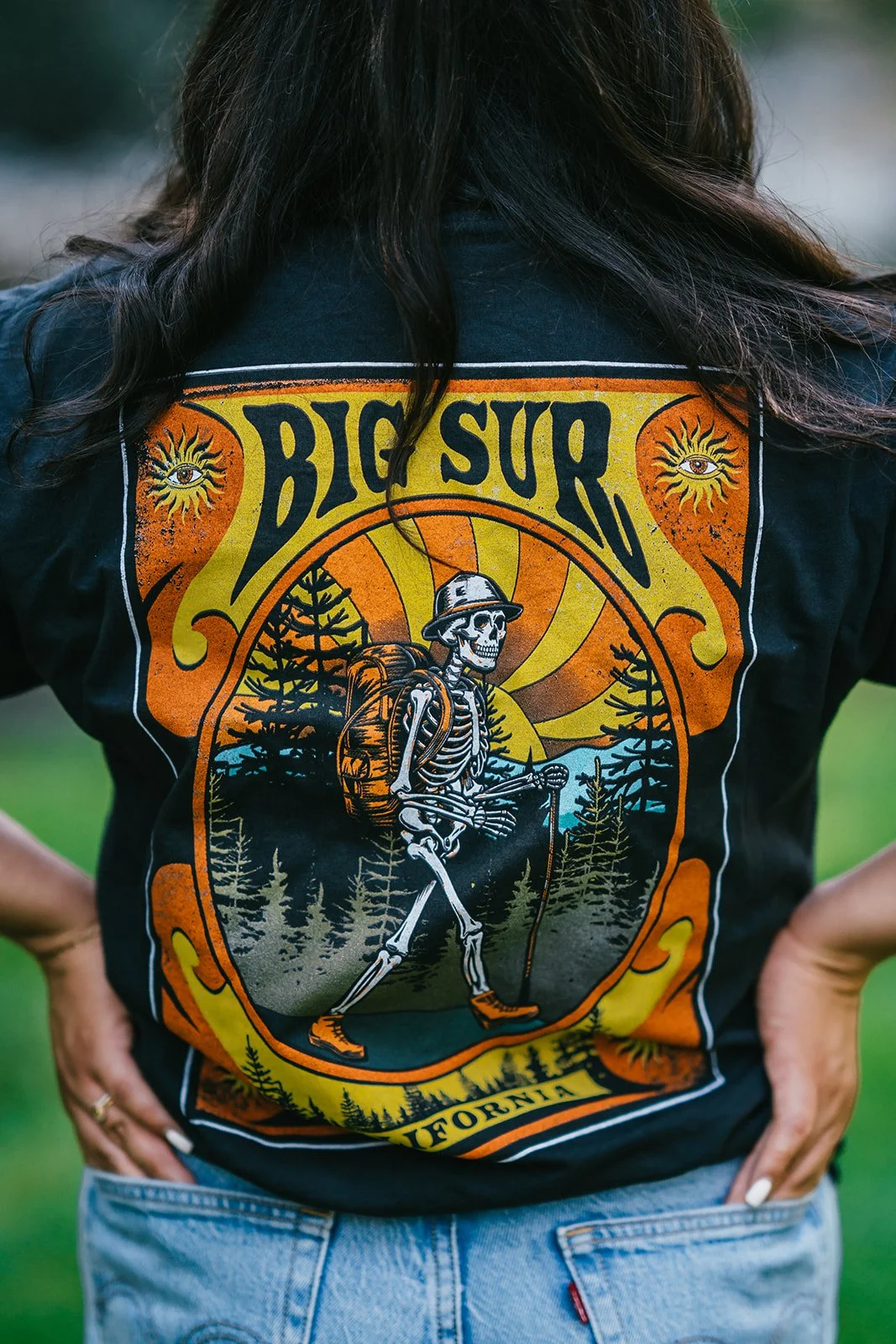 BigSurRiverInn-BigSur-GeneralStore-SkeletonHiking-LongSleeve-Back-Female-FullView-BSRILawn-HannahOvereemPhoto.jpeg