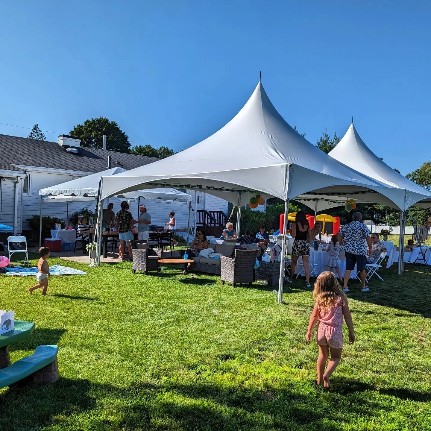 Even on a beautiful 86° day, a tent really saves the day. 
Hosting an August party?  Get in touch today! 
Tents, tables, chairs, linens, lighting, dance floors and more.  All delivered and set up on Thursday or Friday so you can decorate and pr