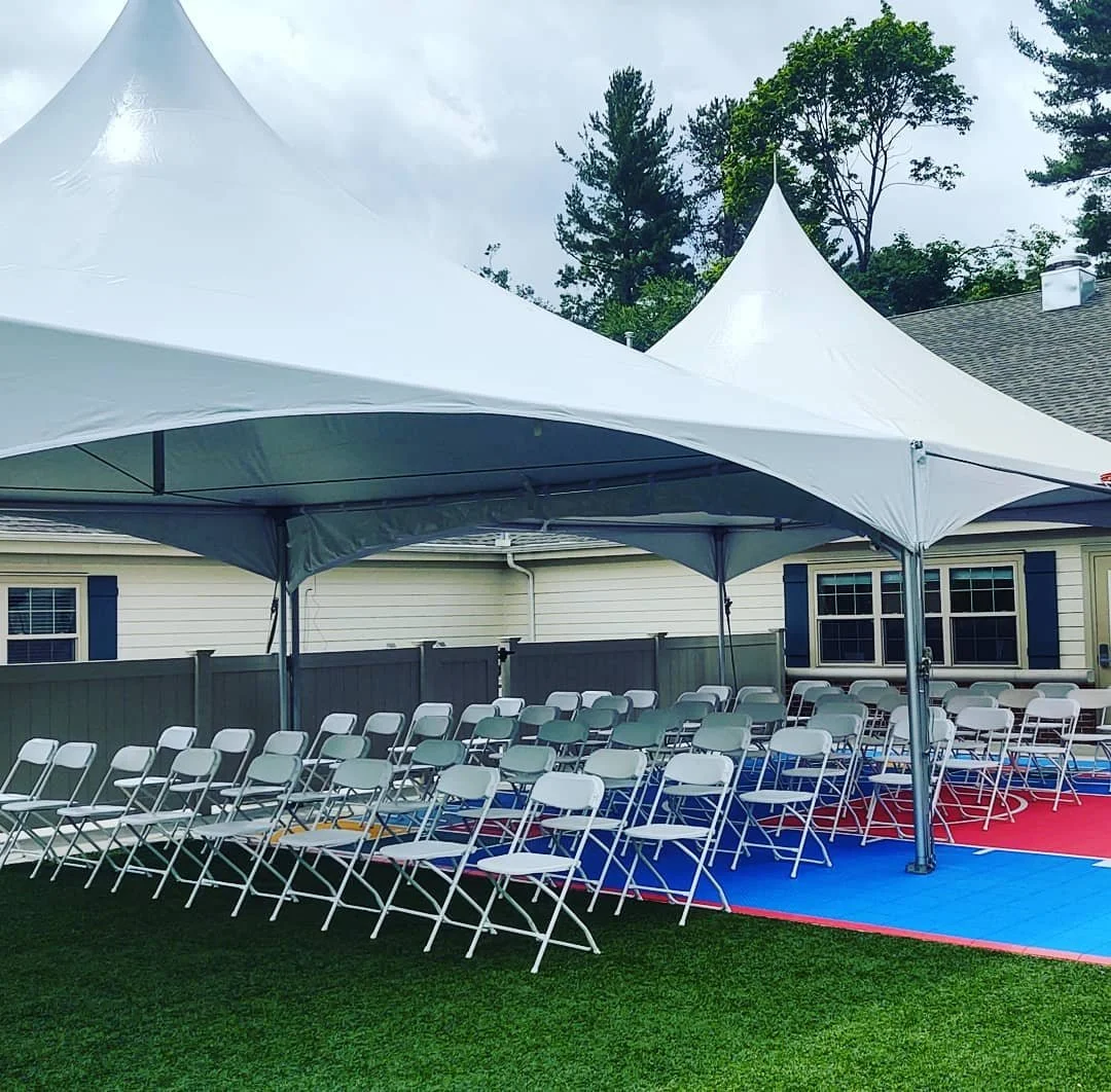 20x40 on astroturf for a private school kindergarten graduation event.  Unfortunately it rained on them last night, but fortunately they added a tent last minute :)