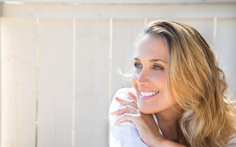 happy smiling confident woman in her 40's in San Diego looking refreshed