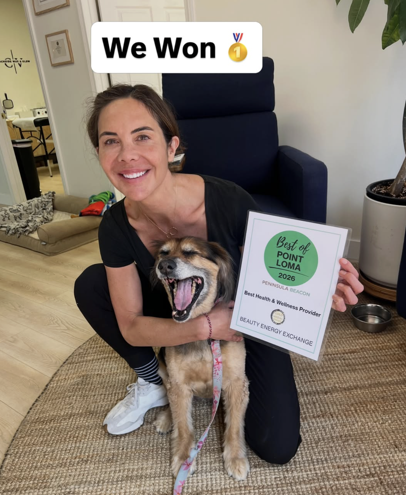 Nyree holding an award for being the best med spa in Point Loma 2026