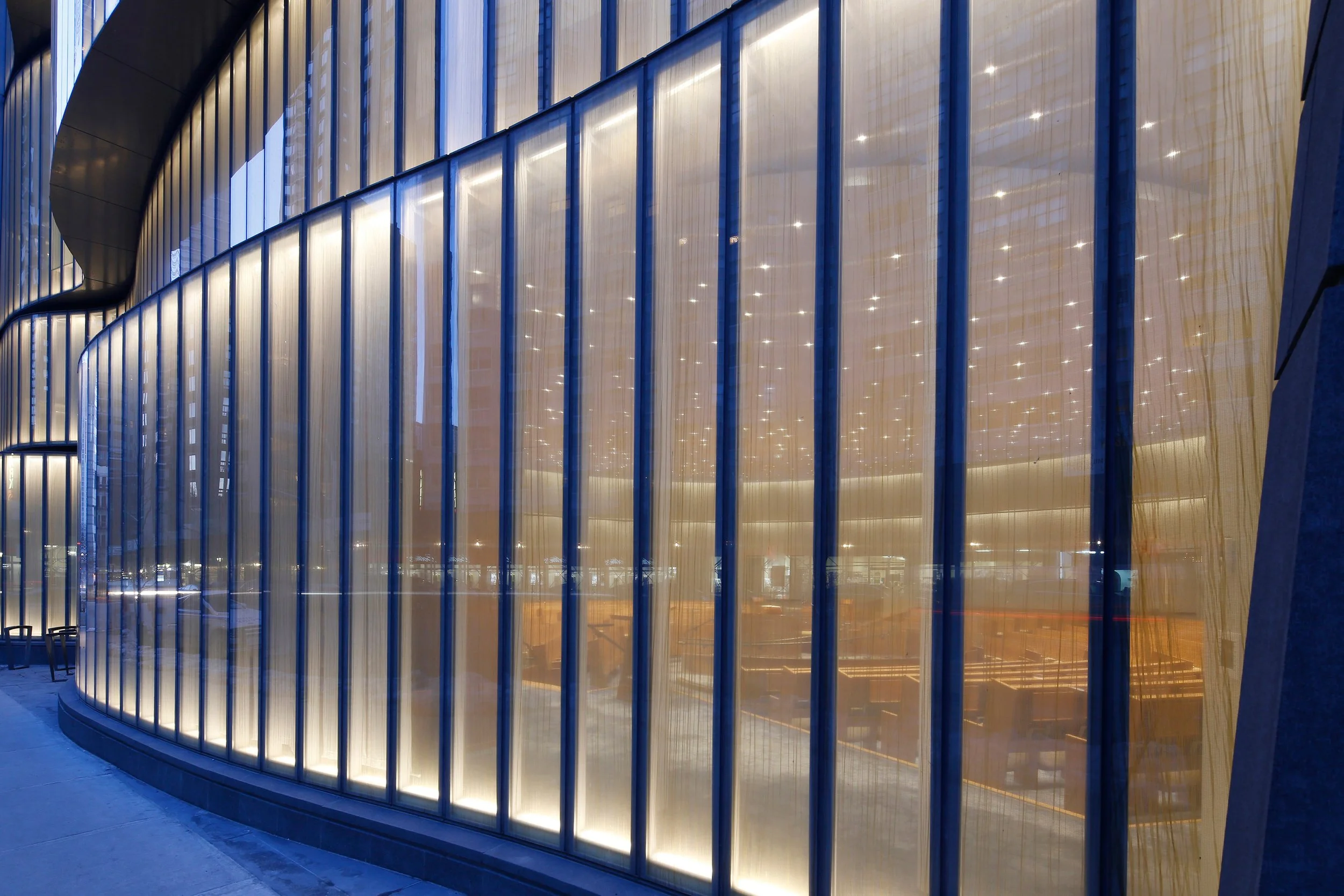 Ext. Close up of Lit Glass