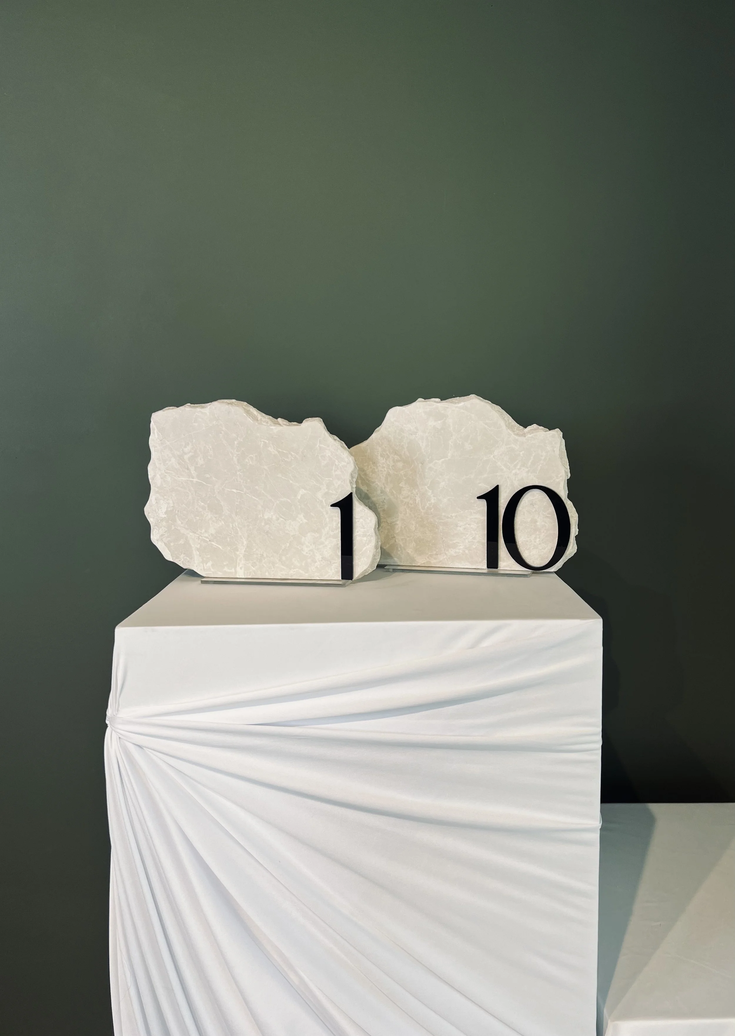 BEIGE STONE TABLE NUMBERS $75.00