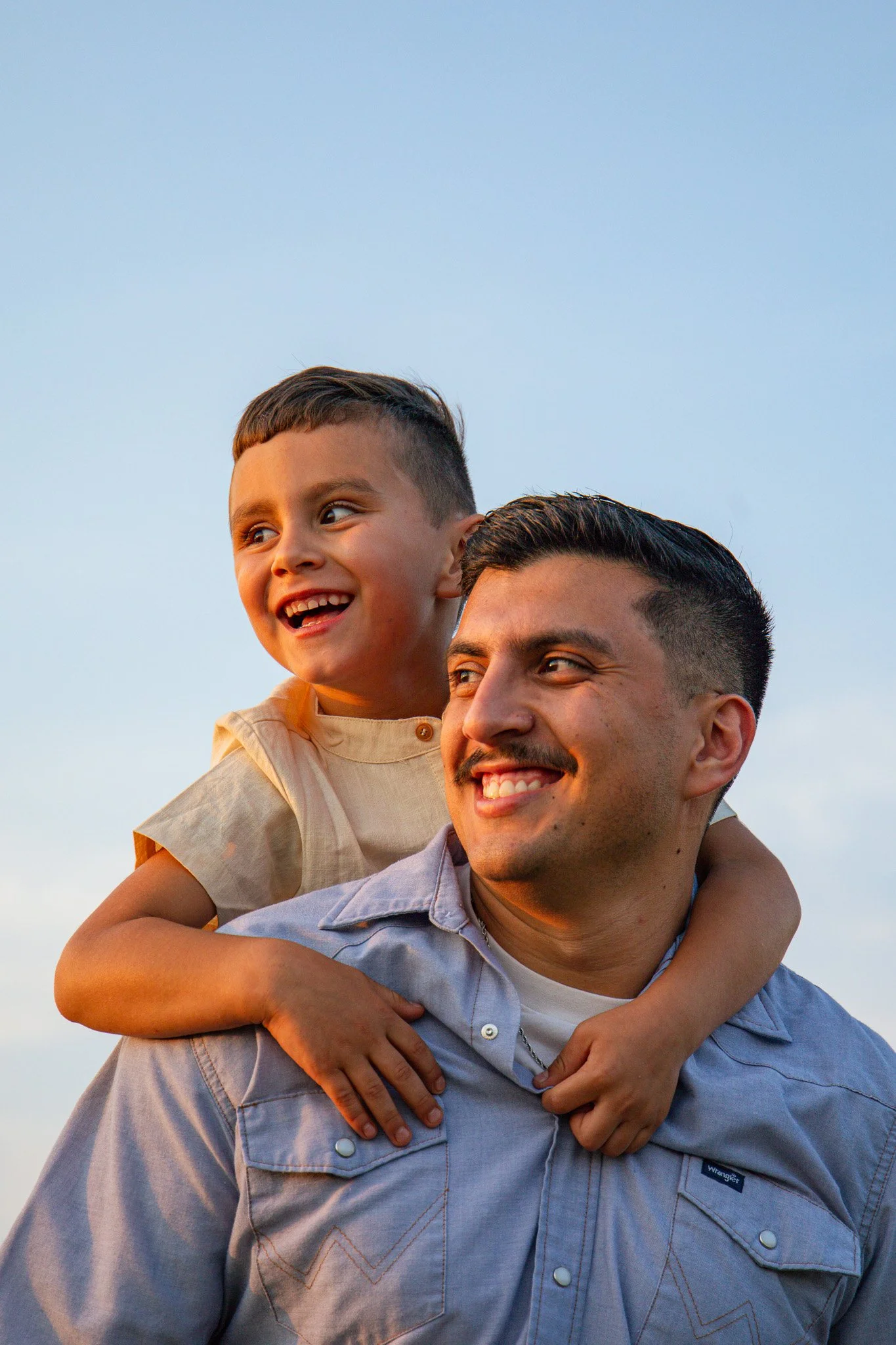 Professional family photography by a small business creative photographer, highlighting the love, joy, and unique bonds in everyday moments that define your family's story.