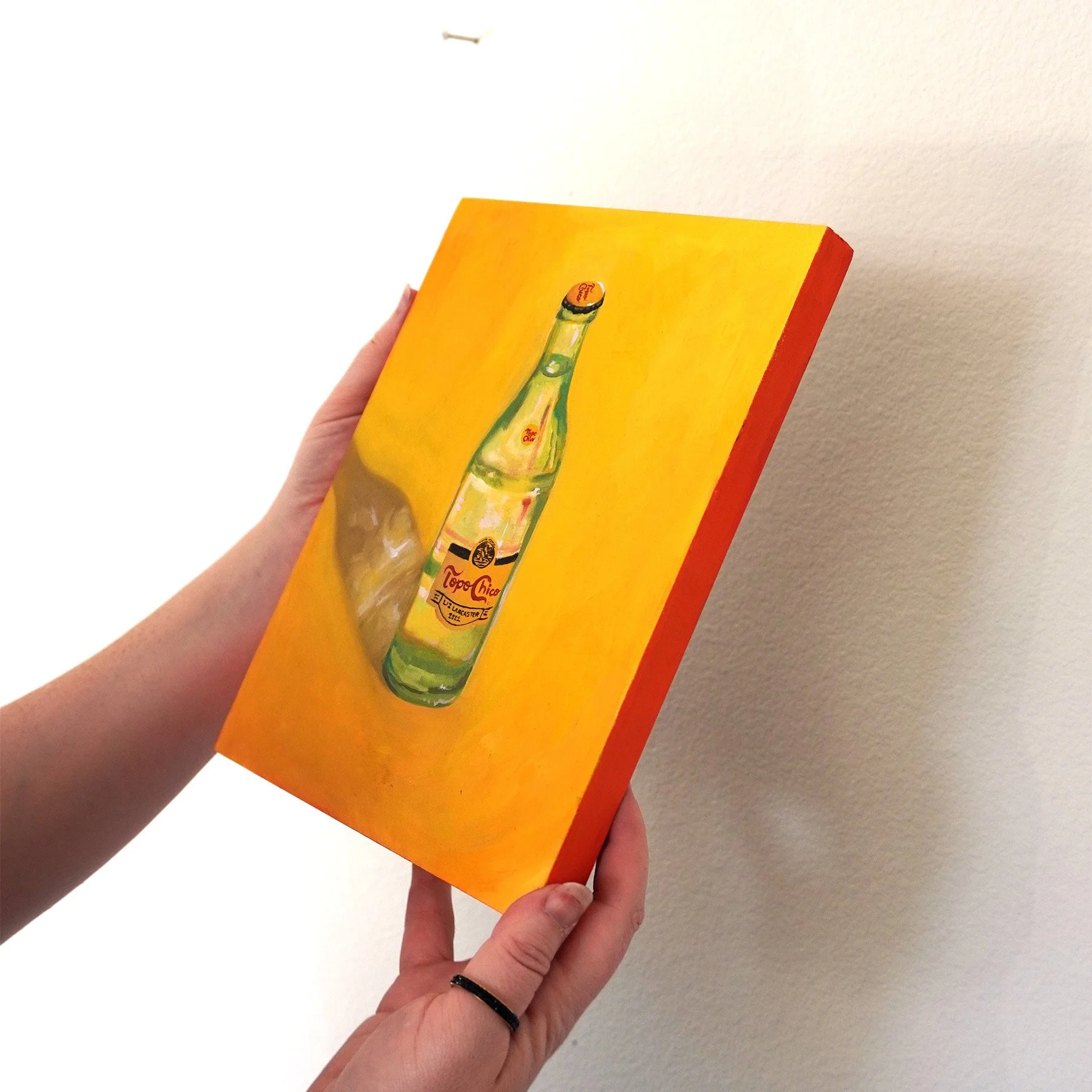 Topo-Chico-Yellow-8x10-holding.jpg