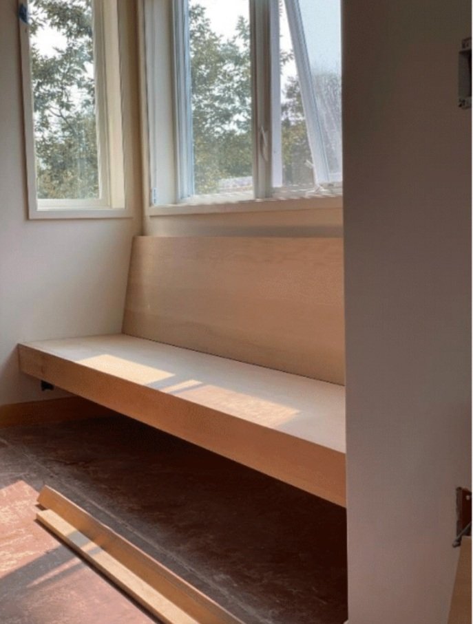  A built-in bench inset into a pocket window.  