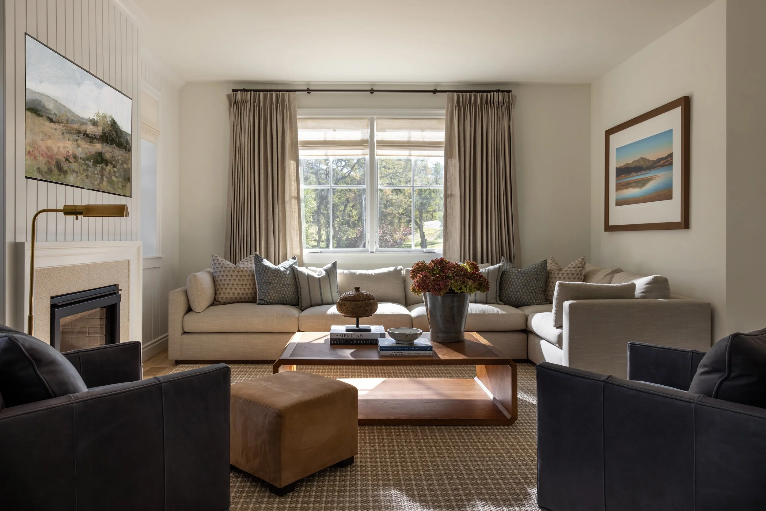 Transitional living room with shiplap fireplace, navy leather chairs, and linen sofa — Bartlett Residence by Tama Bell Design, Ukiah CA