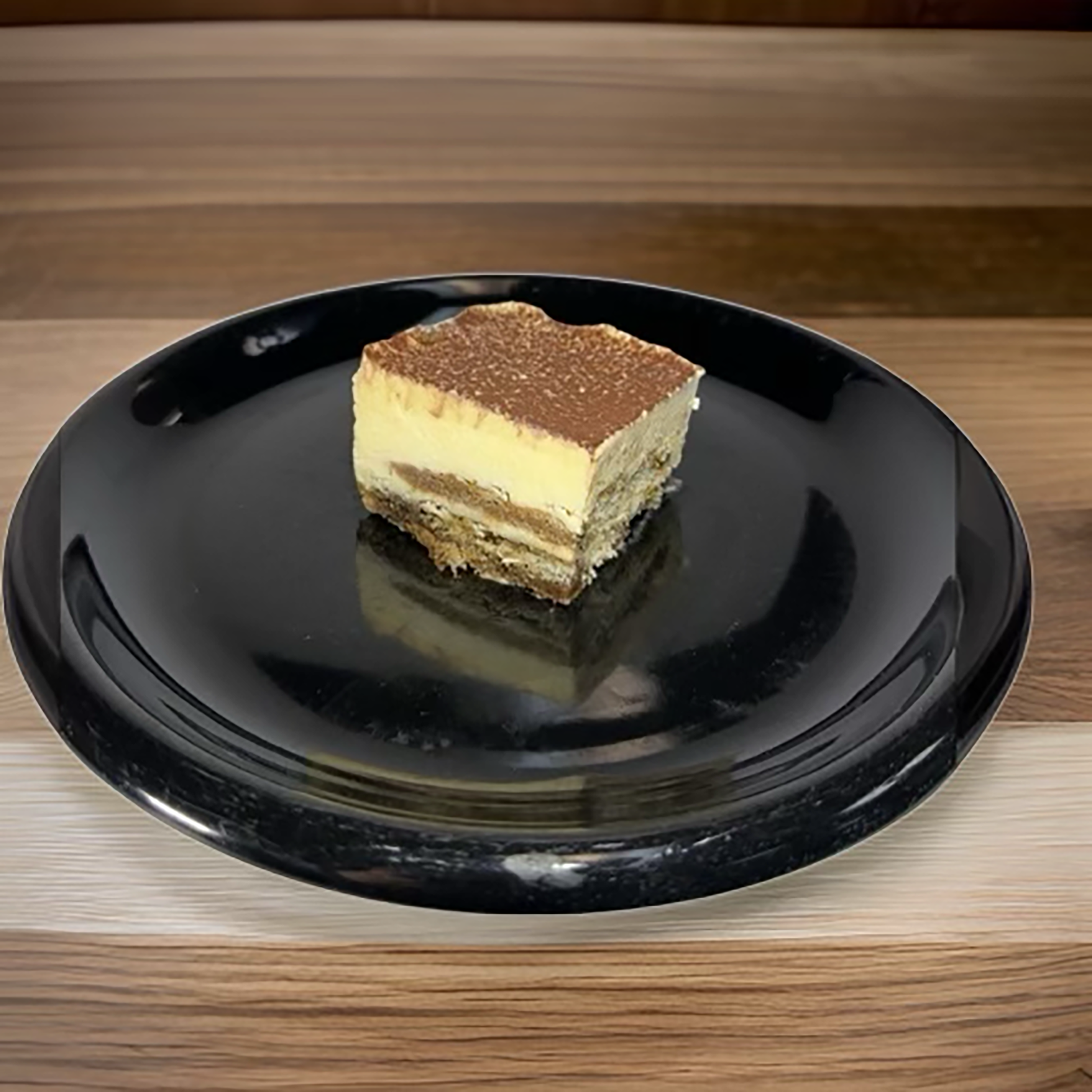 a slice of tiramisu on a tray