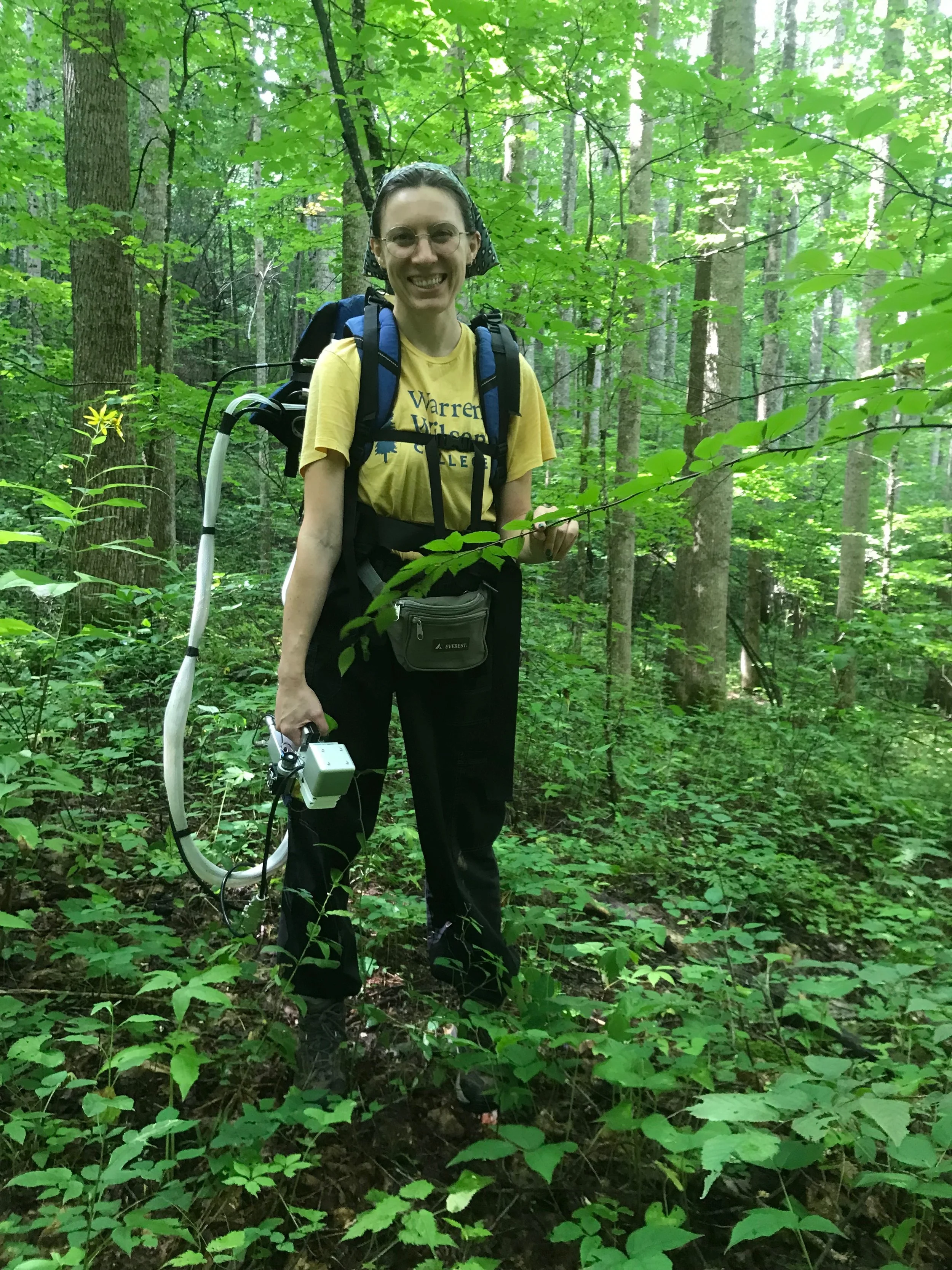 Grace Dougherty using an infrared gas analyzer (IRGA) in the field