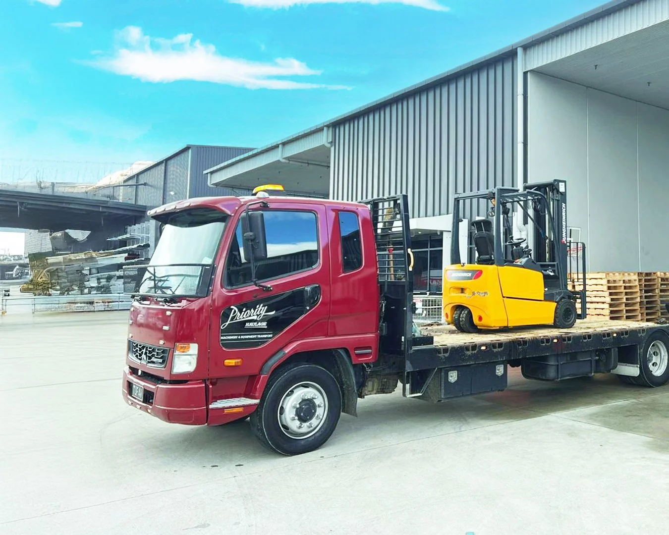Priority Haulage Fuso Fighter forklift transport in Auckland