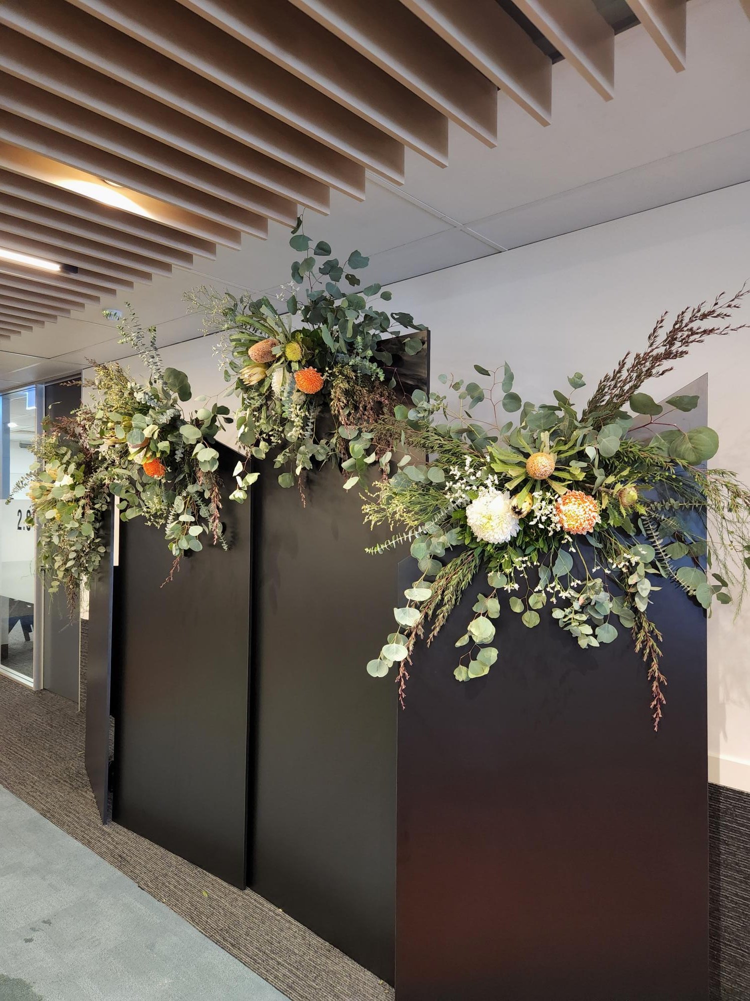 Geometric Black Backdrop Panels with native flowers 1 e.jpg