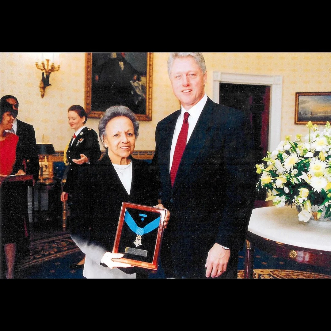 Arlene Fox receiving John Fox’s medal of honor