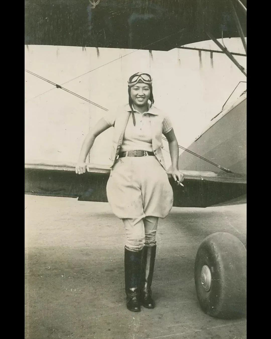 Hazel posing with a plane