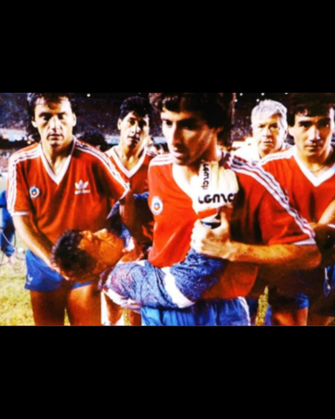 Roberto Rojas being carried off the field