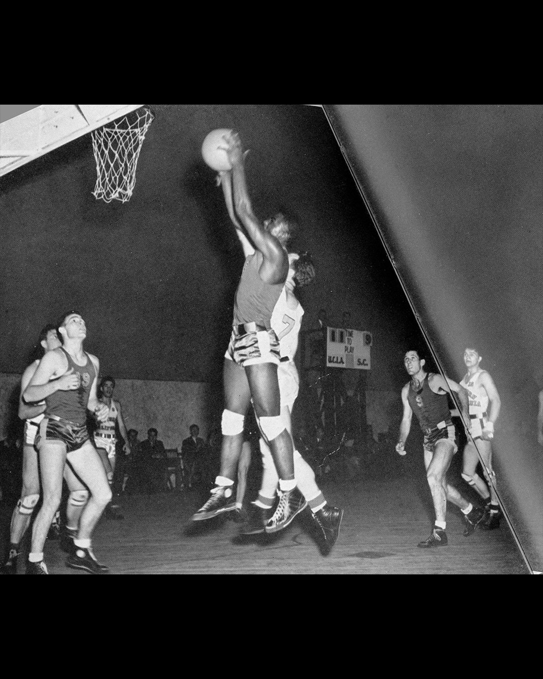 Jackie playing basketball for UCLA