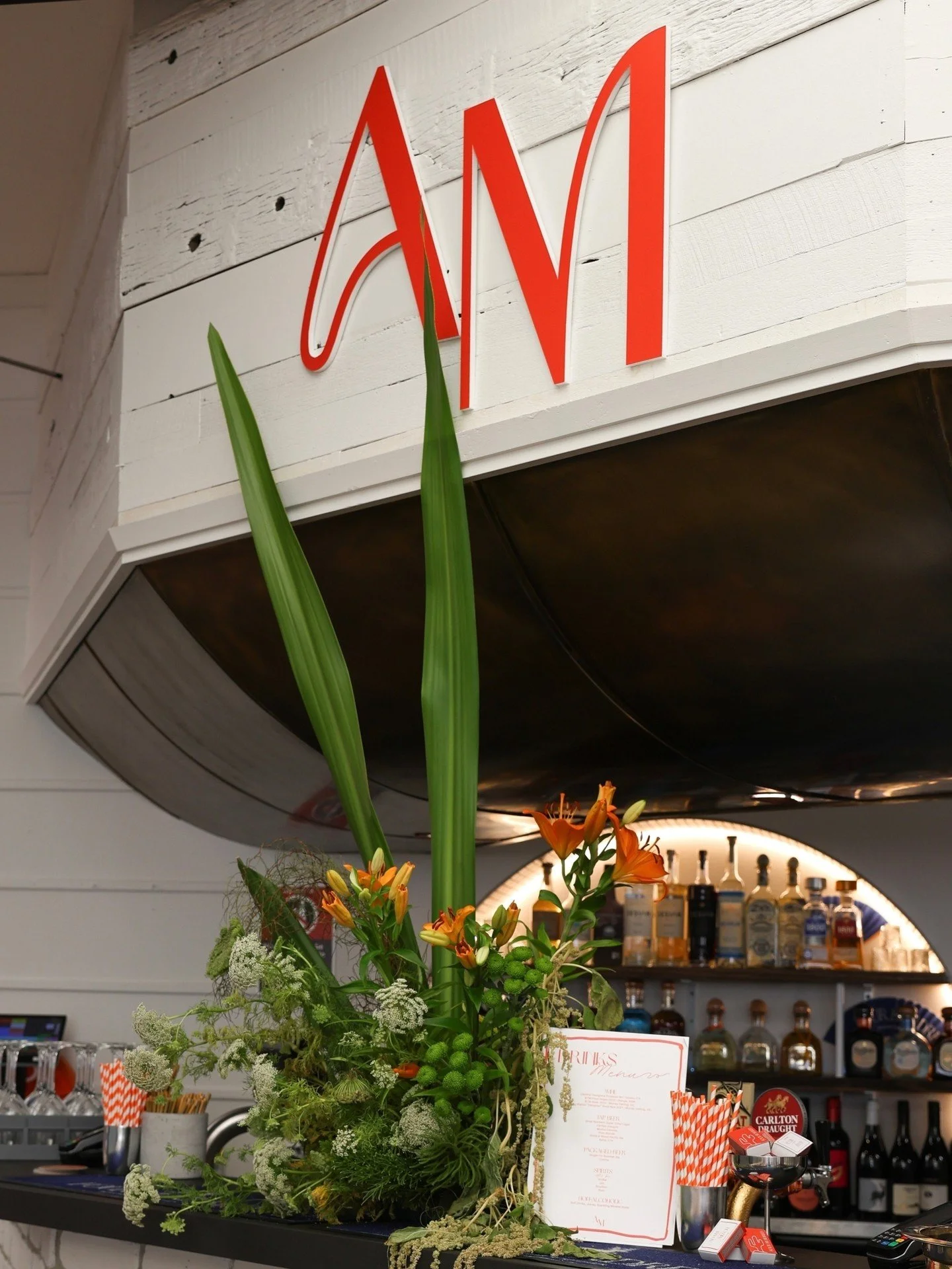 When the boss wants his engagement to look like a brand activation. 

Every detail was curated to compliment the venue whilst also adding in Adam and Mitch' personalities from sculptural melting chrome elements, a couple logo, personalised straws and