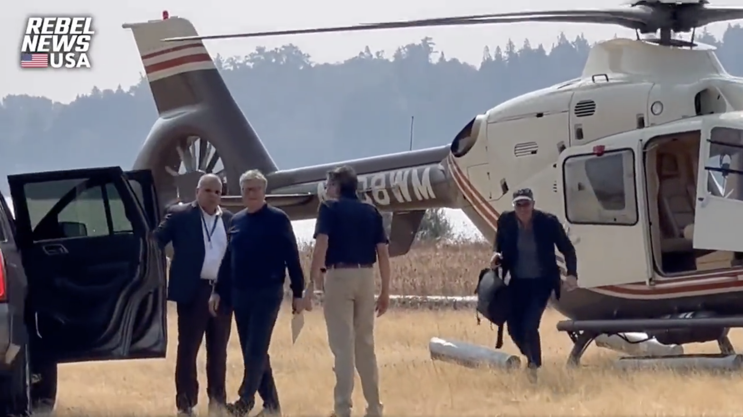 Gates' hears Lassley and looks over