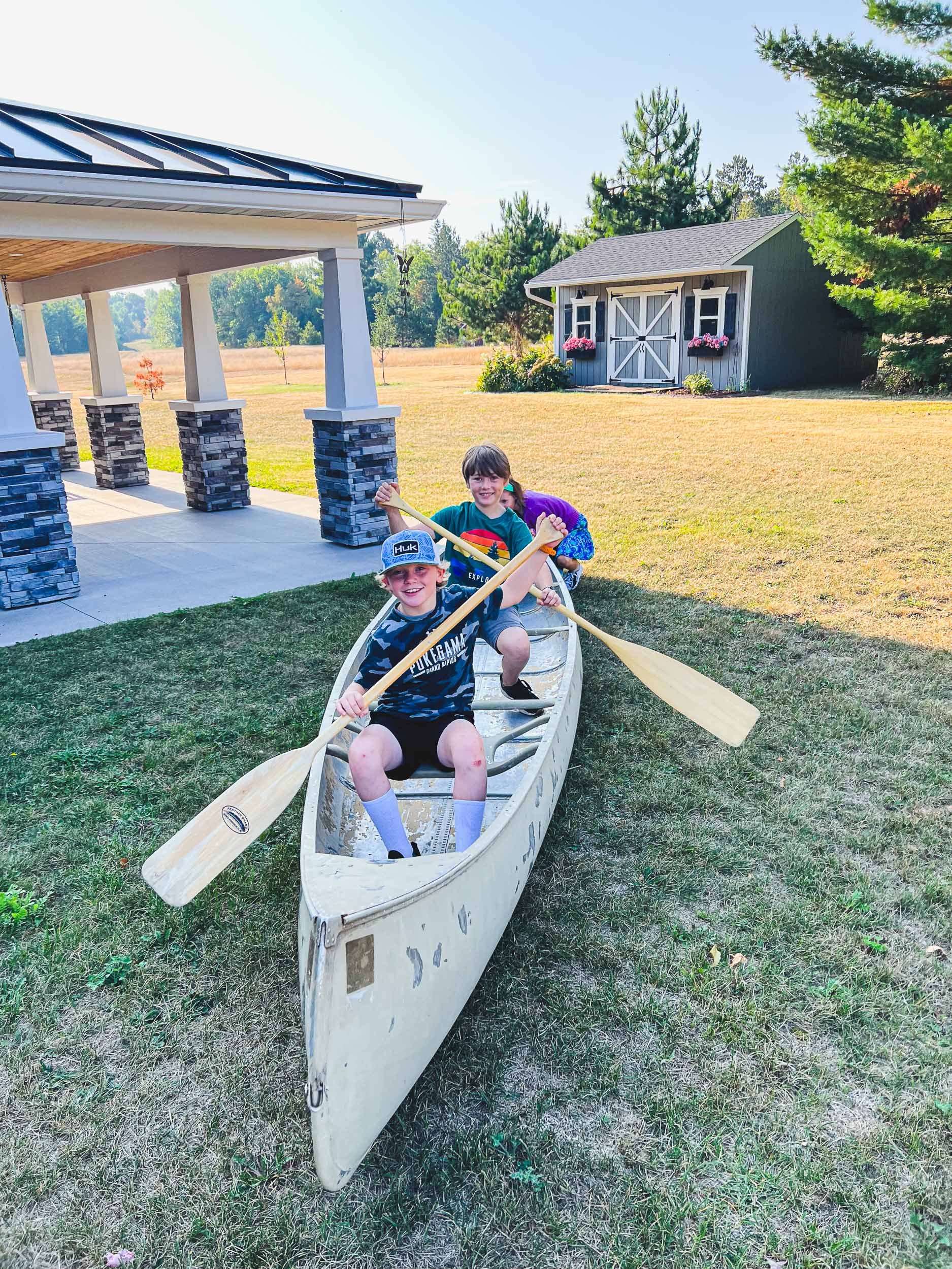 kids-playing-in-canoe.jpg