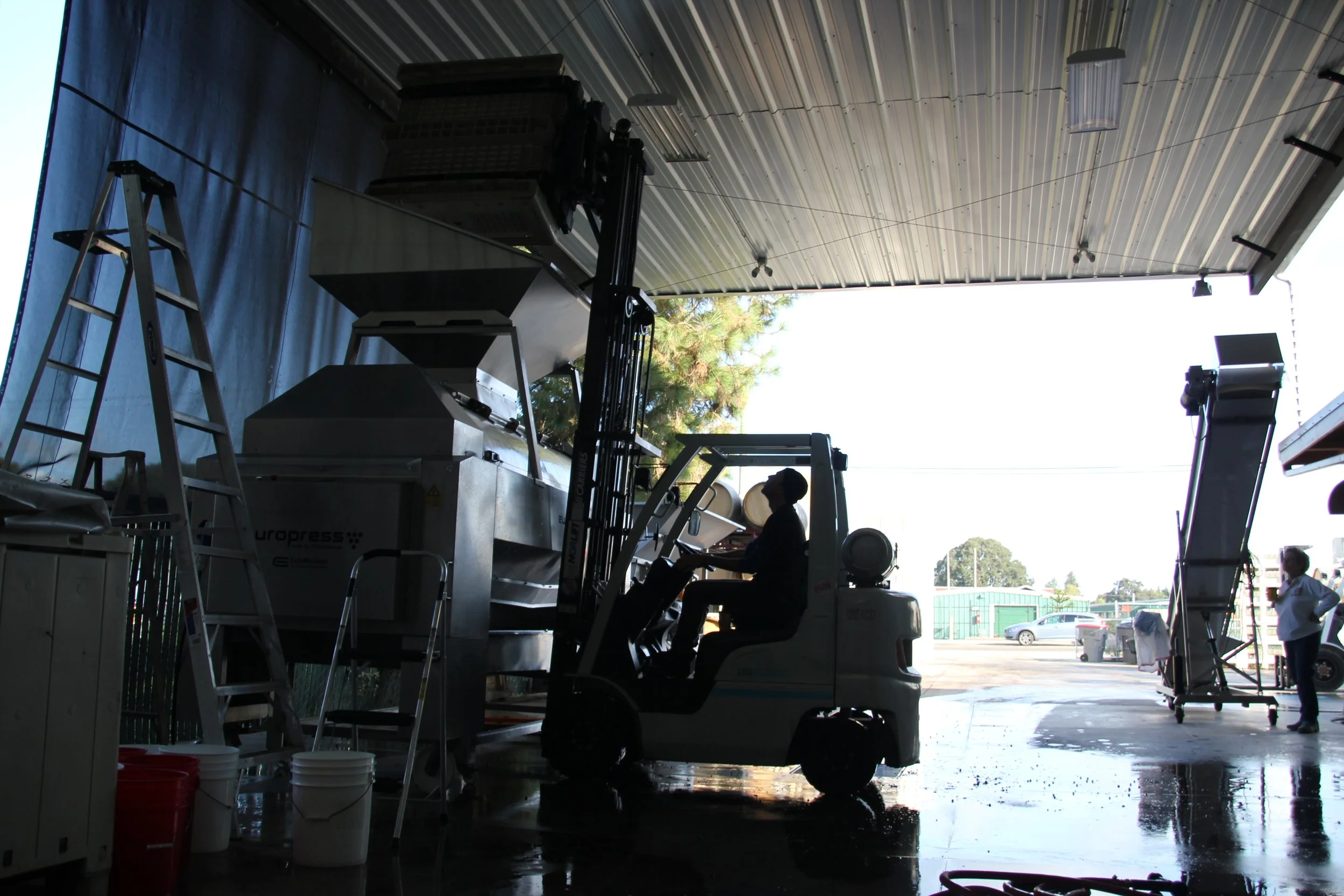 John Grochau loading pneumatic press .JPG