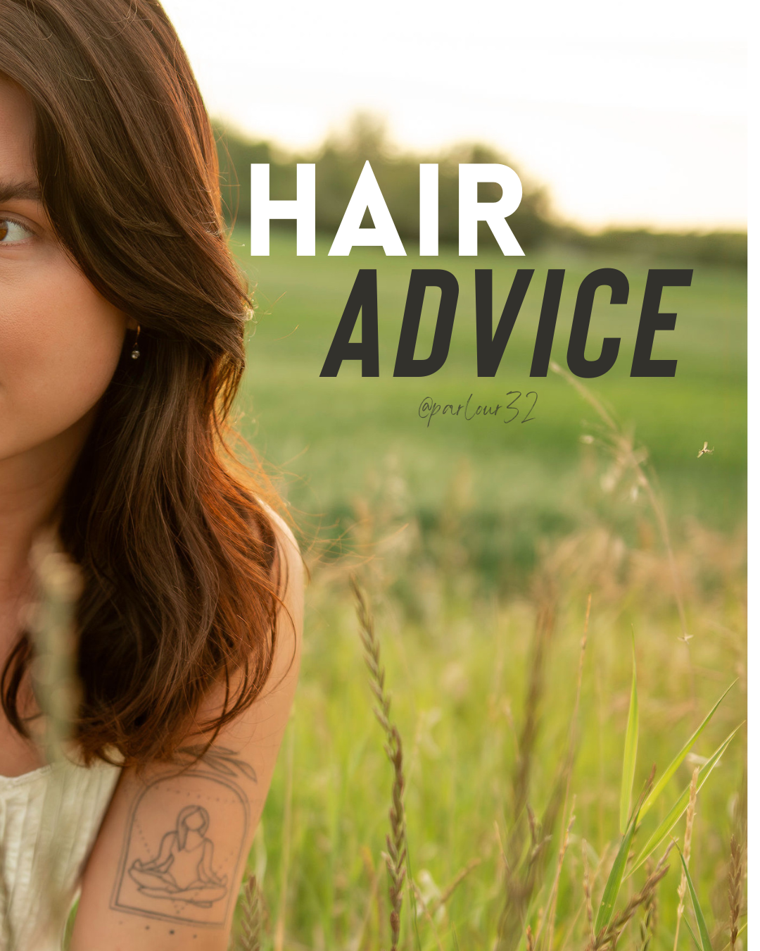 Close-up of a woman with brown wavy hair and a tattoo sitting in a field of tall grass during sunset with the text 'Hair Advice' and the handle '@parlour32' overlaid.